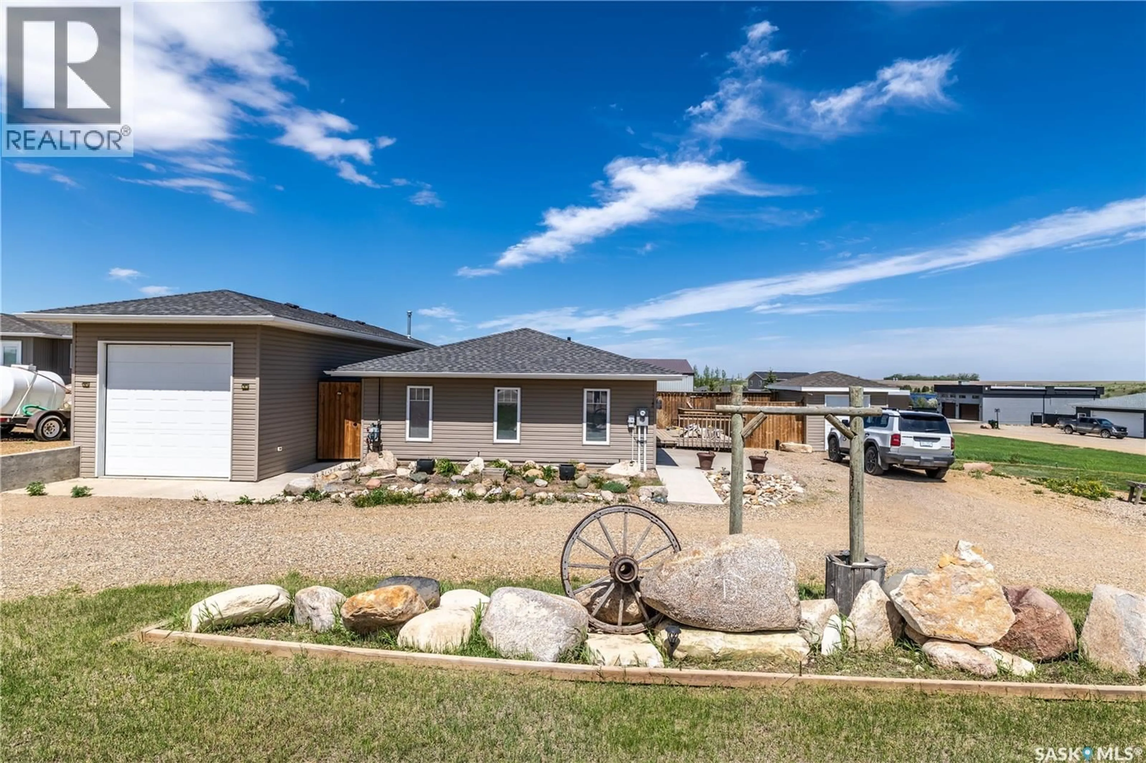 A pic from outside/outdoor area/front of a property/back of a property/a pic from drone, street for 11 SUNRISE BOULEVARD, Craik Rm No. 222 Saskatchewan S0G0V0