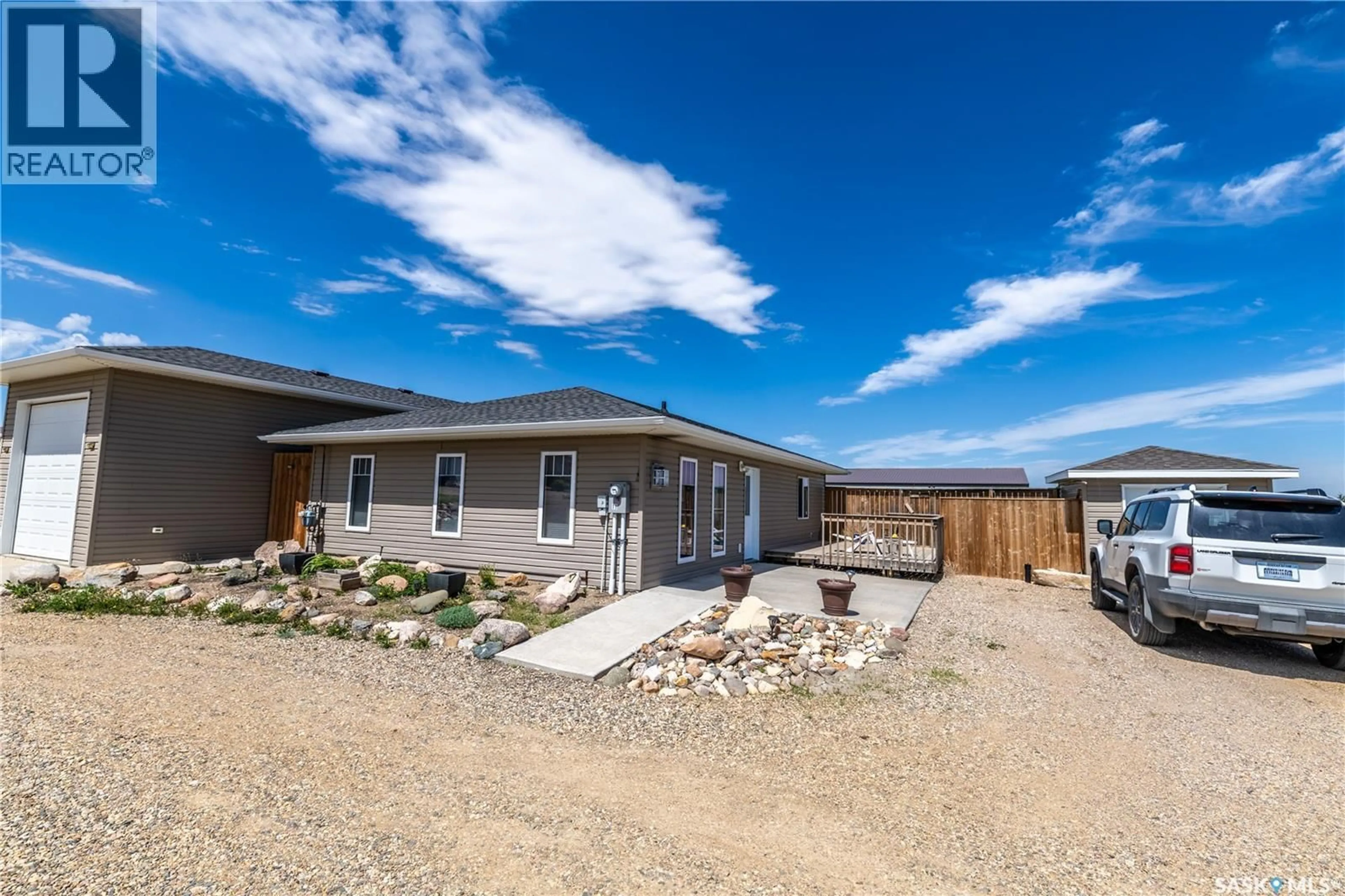 A pic from outside/outdoor area/front of a property/back of a property/a pic from drone, street for 11 SUNRISE BOULEVARD, Craik Rm No. 222 Saskatchewan S0G0V0