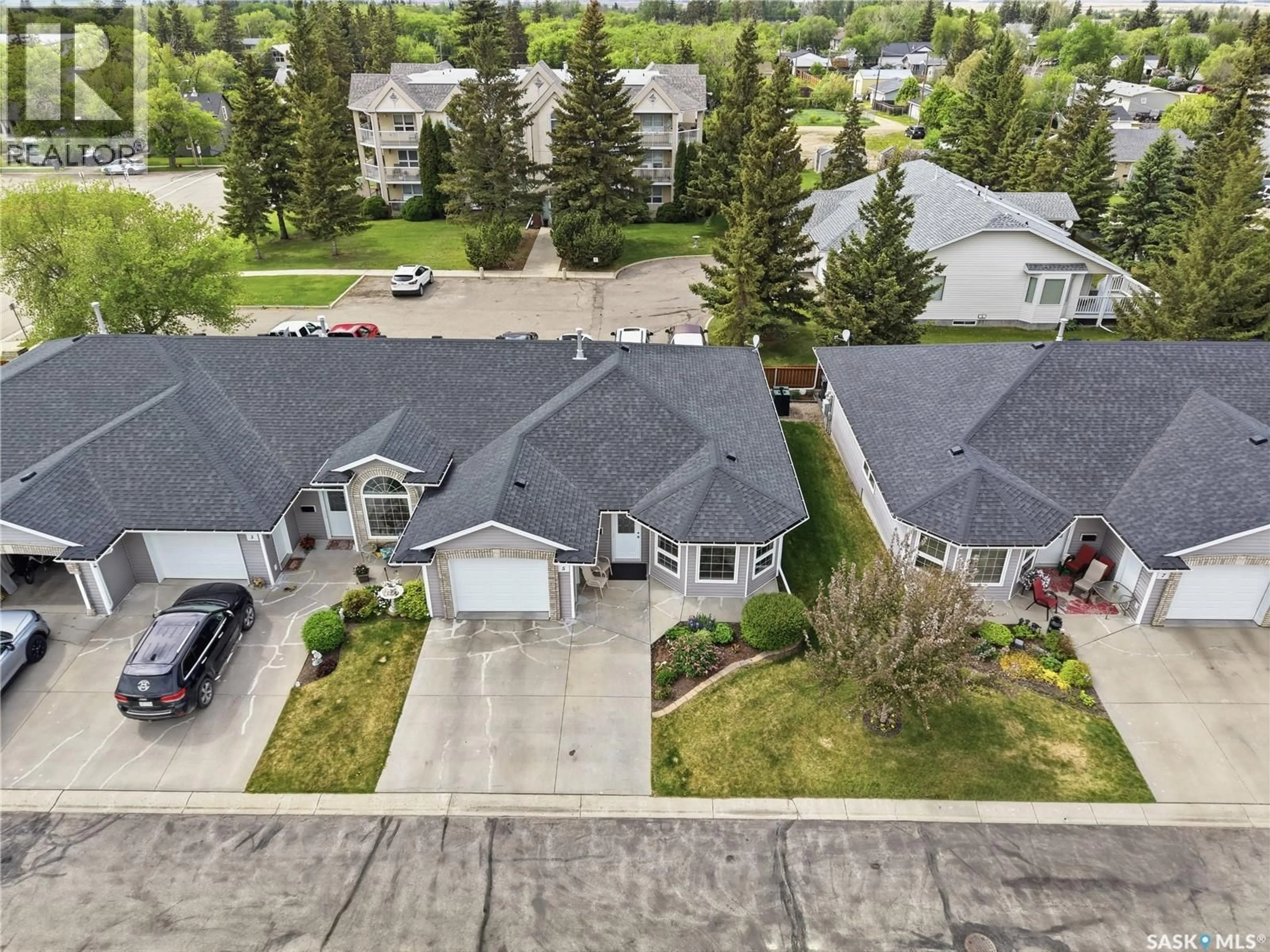 A pic from outside/outdoor area/front of a property/back of a property/a pic from drone, street for 5 206 ROSS AVENUE, Dalmeny Saskatchewan S0K1E0
