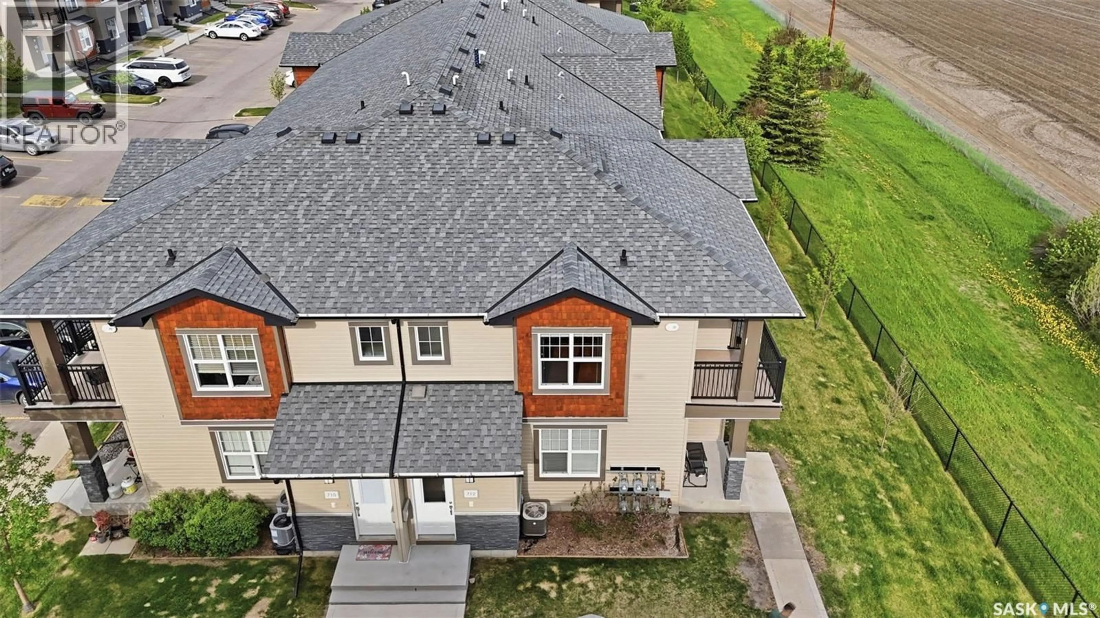 A pic from outside/outdoor area/front of a property/back of a property/a pic from drone, street for 1015 - 712 PATRICK CRESCENT, Saskatoon Saskatchewan S7W0M1