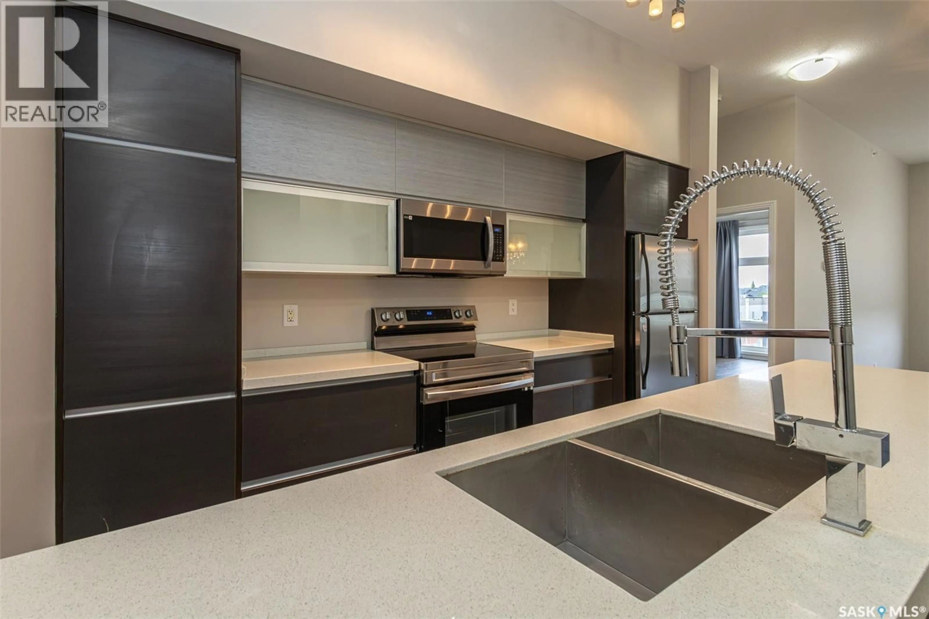 Open concept kitchen, ceramic/tile floor for 225 - 307 MANINGAS BEND, Saskatoon Saskatchewan S7W0P9