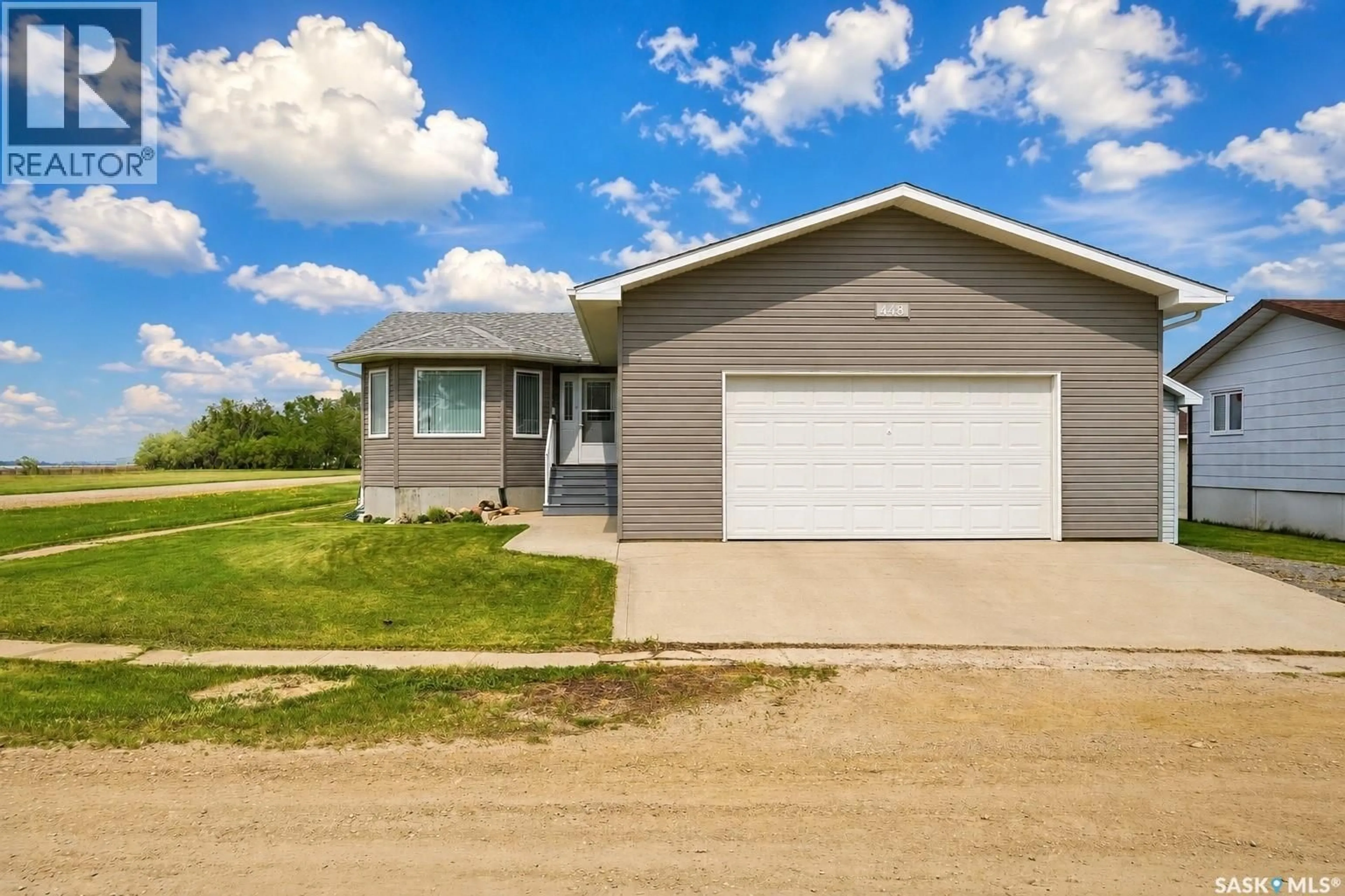 Home with vinyl exterior material, street for 448 MARTIN CRESCENT, Sedley Saskatchewan S0G4K0