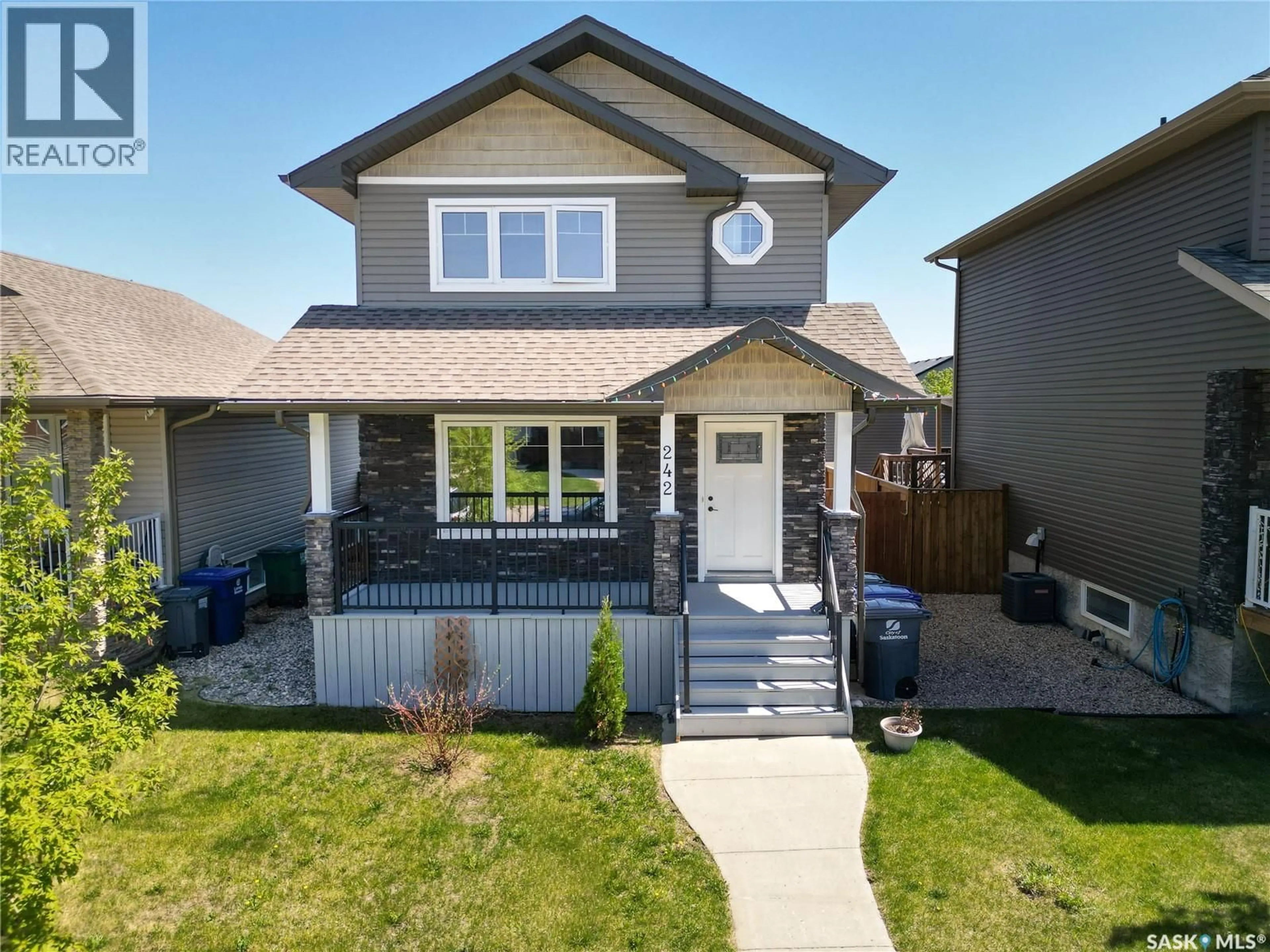 Home with vinyl exterior material, street for 242 GEARY CRESCENT, Saskatoon Saskatchewan S7R0E6