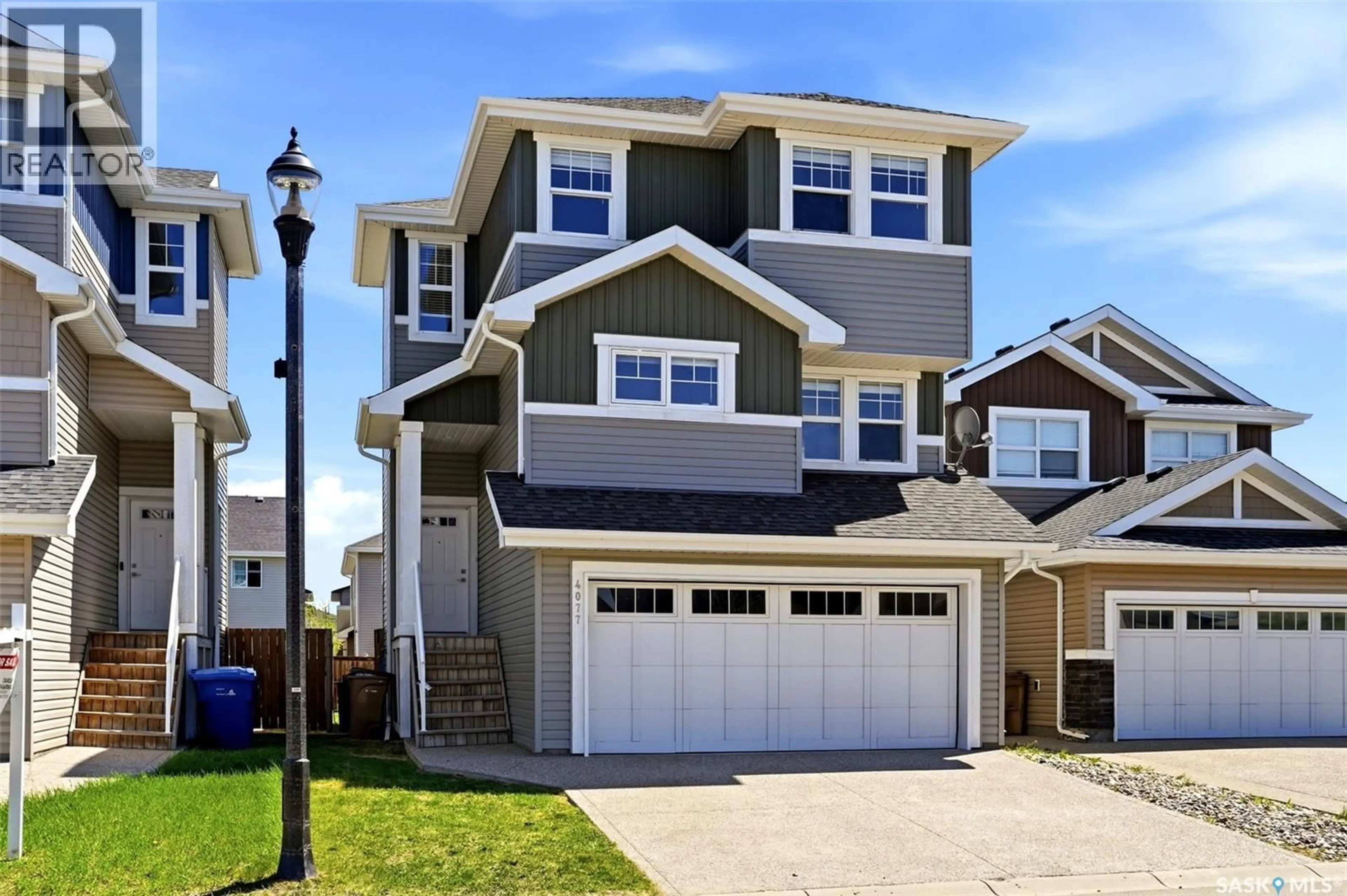 Home with vinyl exterior material, street for 4077 DELHAYE WAY, Regina Saskatchewan S4W0N3