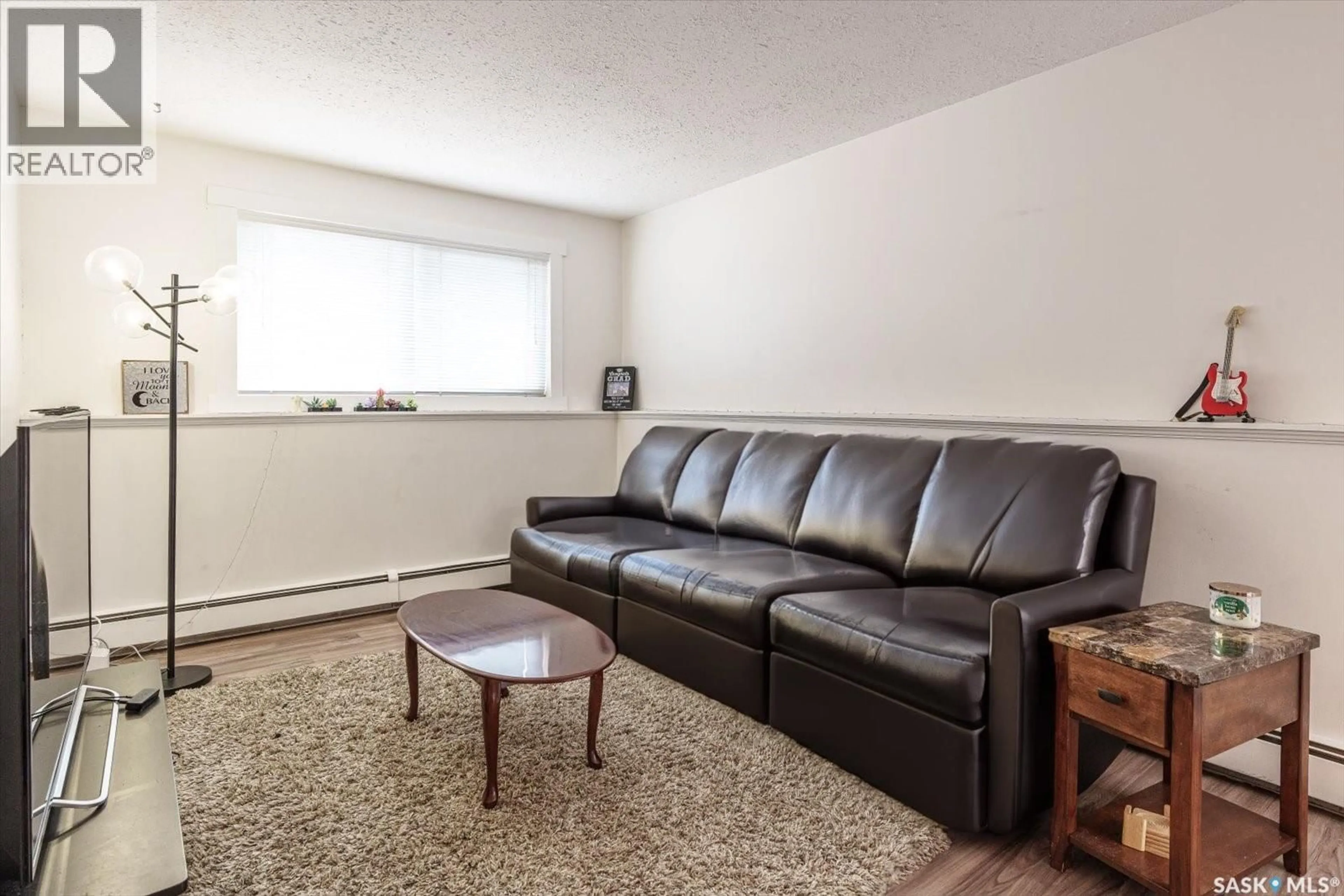 Living room with furniture, unknown for 106 - 1013 LANSDOWNE AVENUE, Saskatoon Saskatchewan S7H2C2