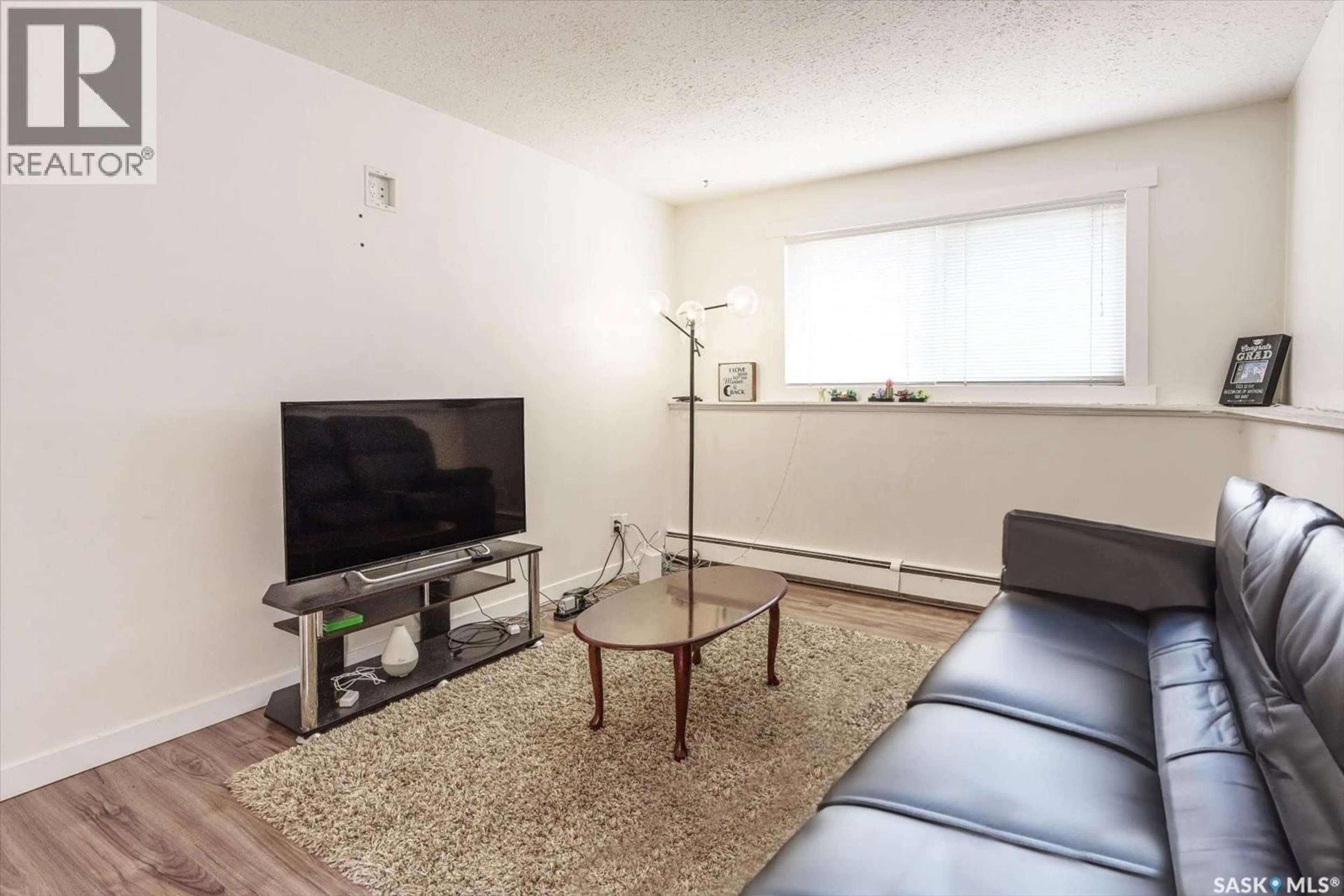 Living room with furniture, unknown for 106 - 1013 LANSDOWNE AVENUE, Saskatoon Saskatchewan S7H2C2