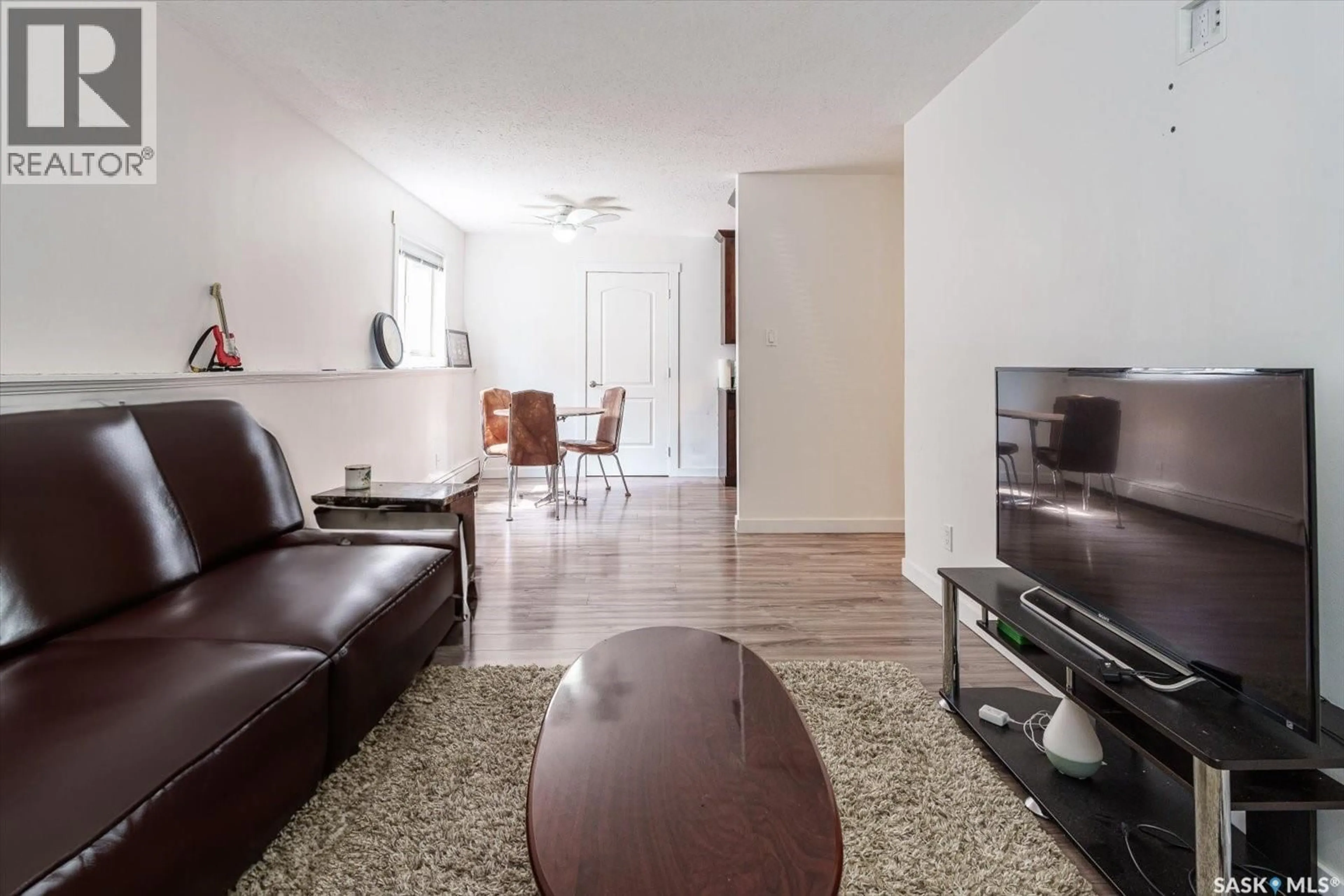 Living room with furniture, unknown for 106 - 1013 LANSDOWNE AVENUE, Saskatoon Saskatchewan S7H2C2