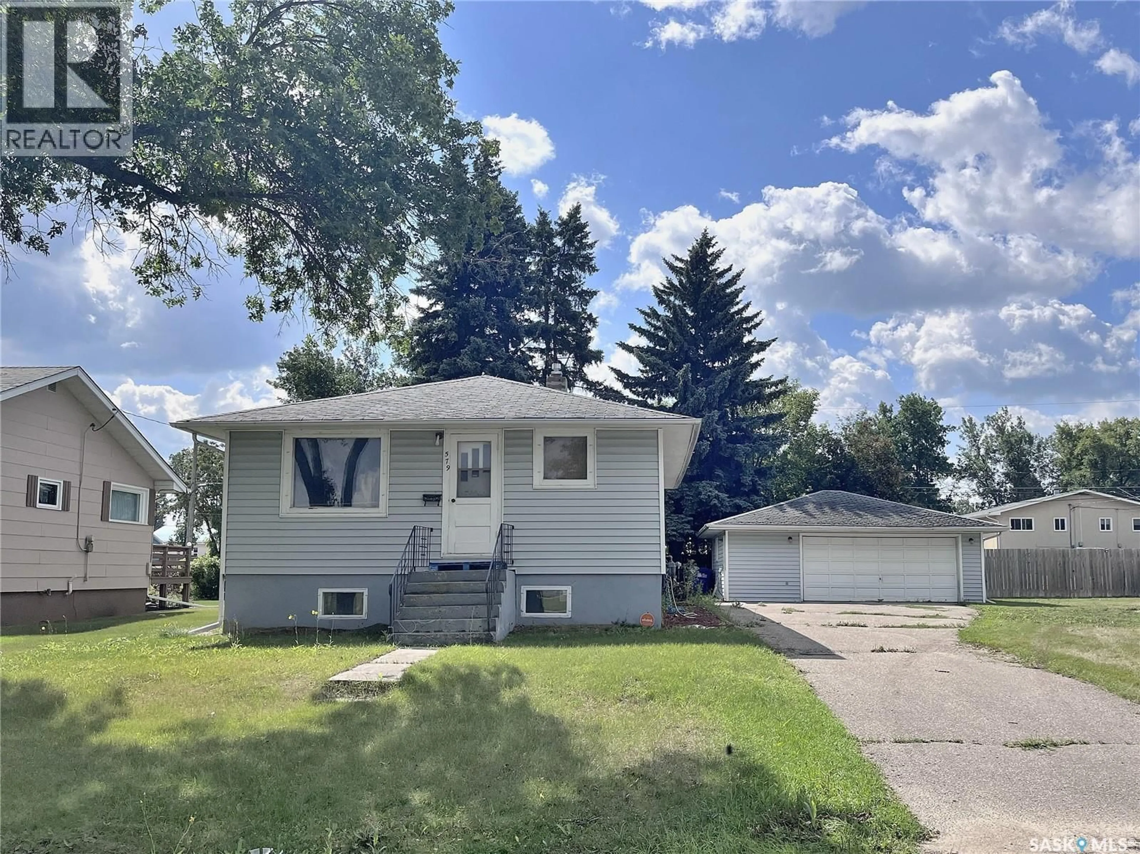Home with vinyl exterior material, street for 579 25TH STREET, Prince Albert Saskatchewan S6V1T4