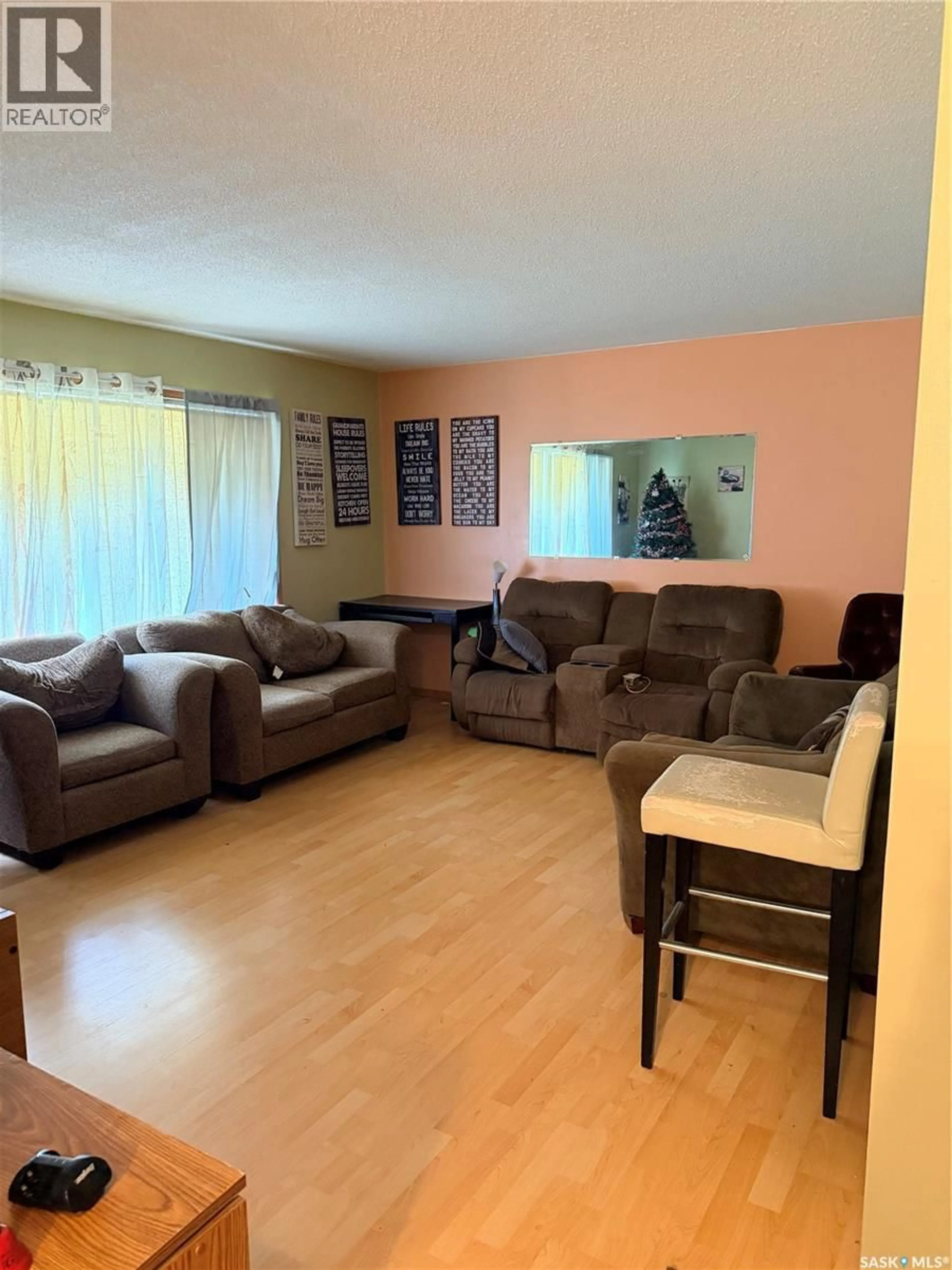 Living room with furniture, unknown for 512 MCNAB STREET, Burstall Saskatchewan S0N0H0