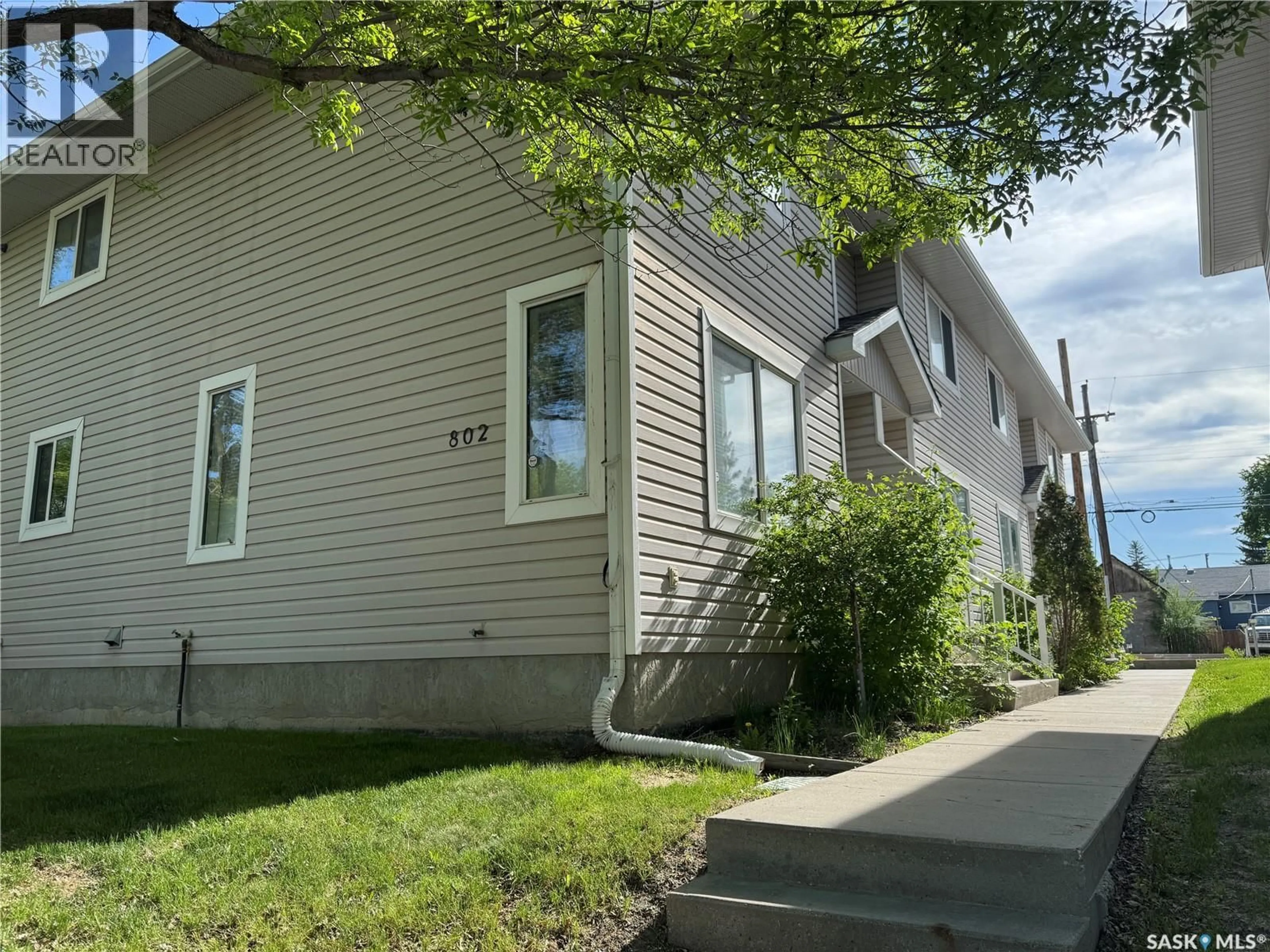 Home with vinyl exterior material, street for N - 2 802 K AVENUE, Saskatoon Saskatchewan S7L2N1