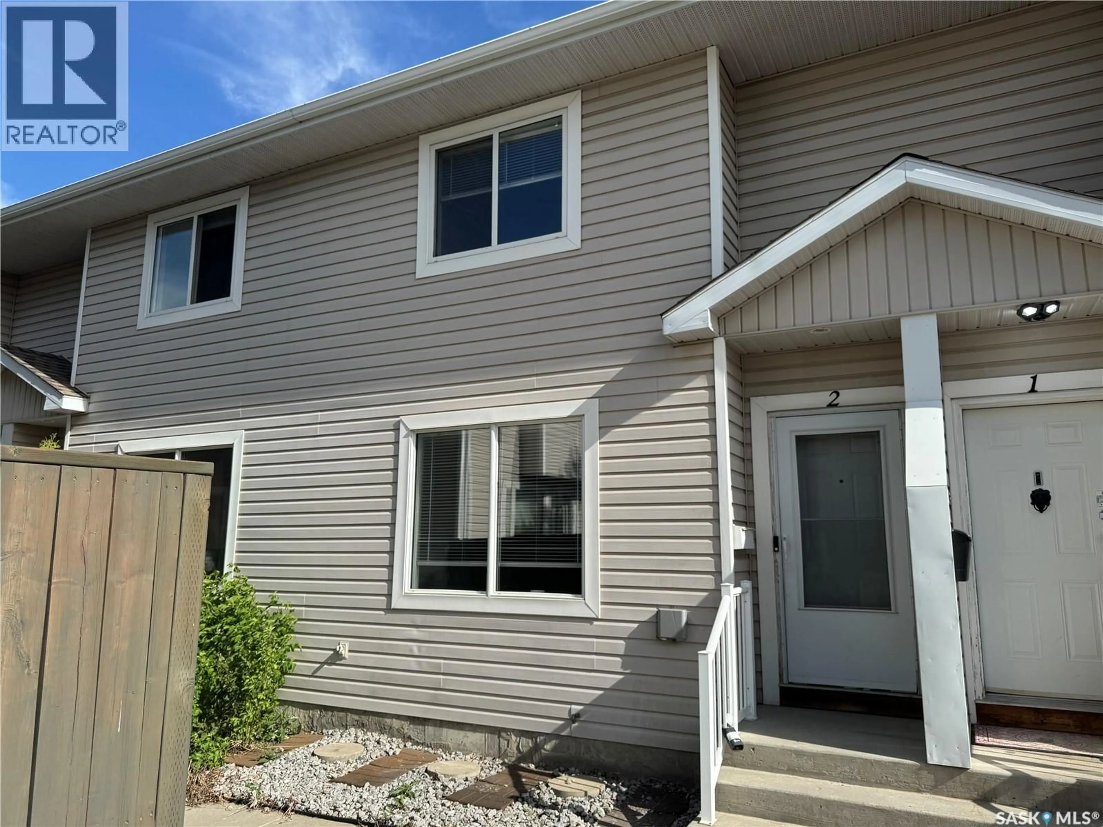 Home with vinyl exterior material, street for N - 2 802 K AVENUE, Saskatoon Saskatchewan S7L2N1