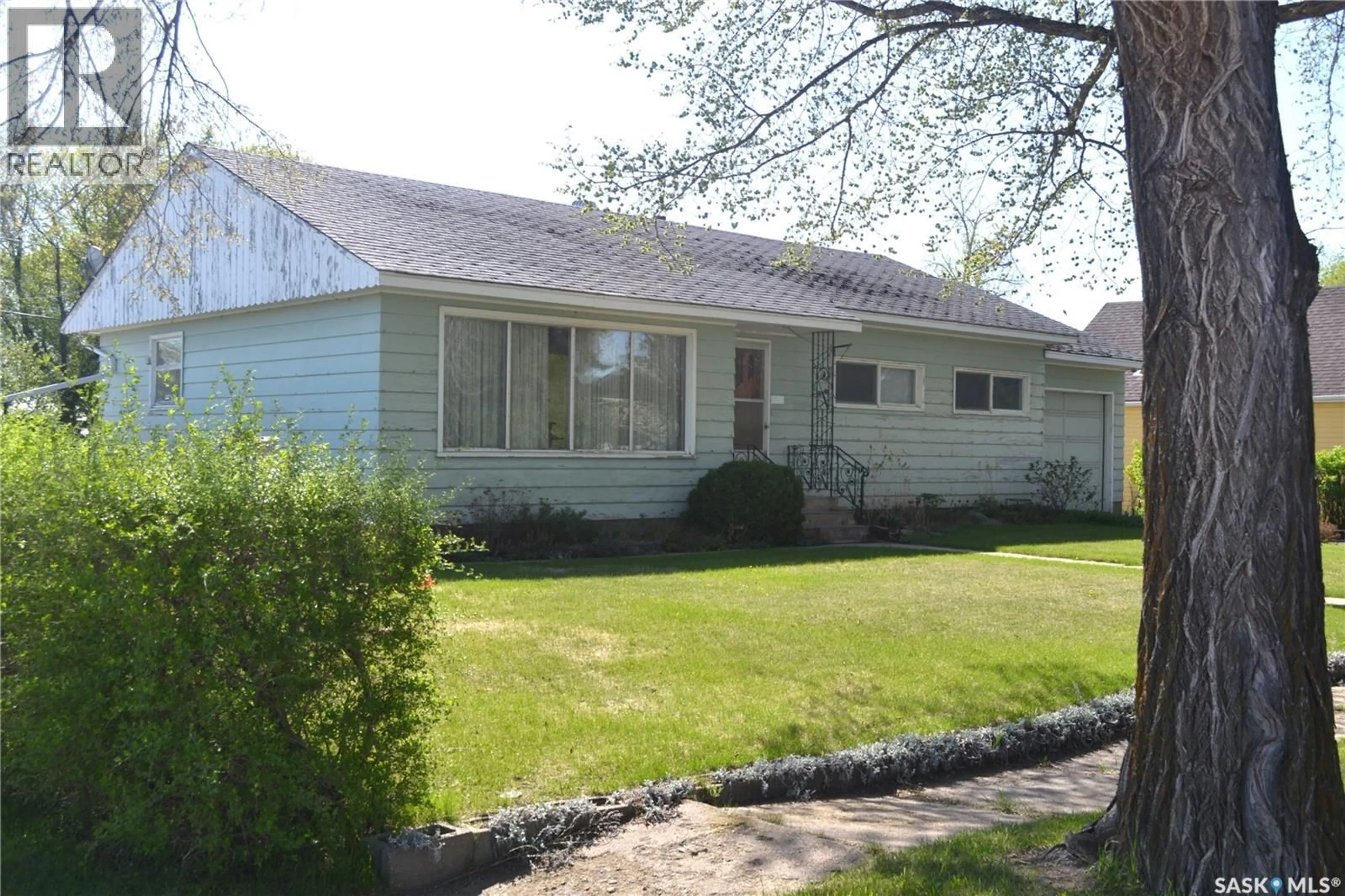 Home with vinyl exterior material, street for 100 MAIN STREET, Radisson Saskatchewan S0K3L0