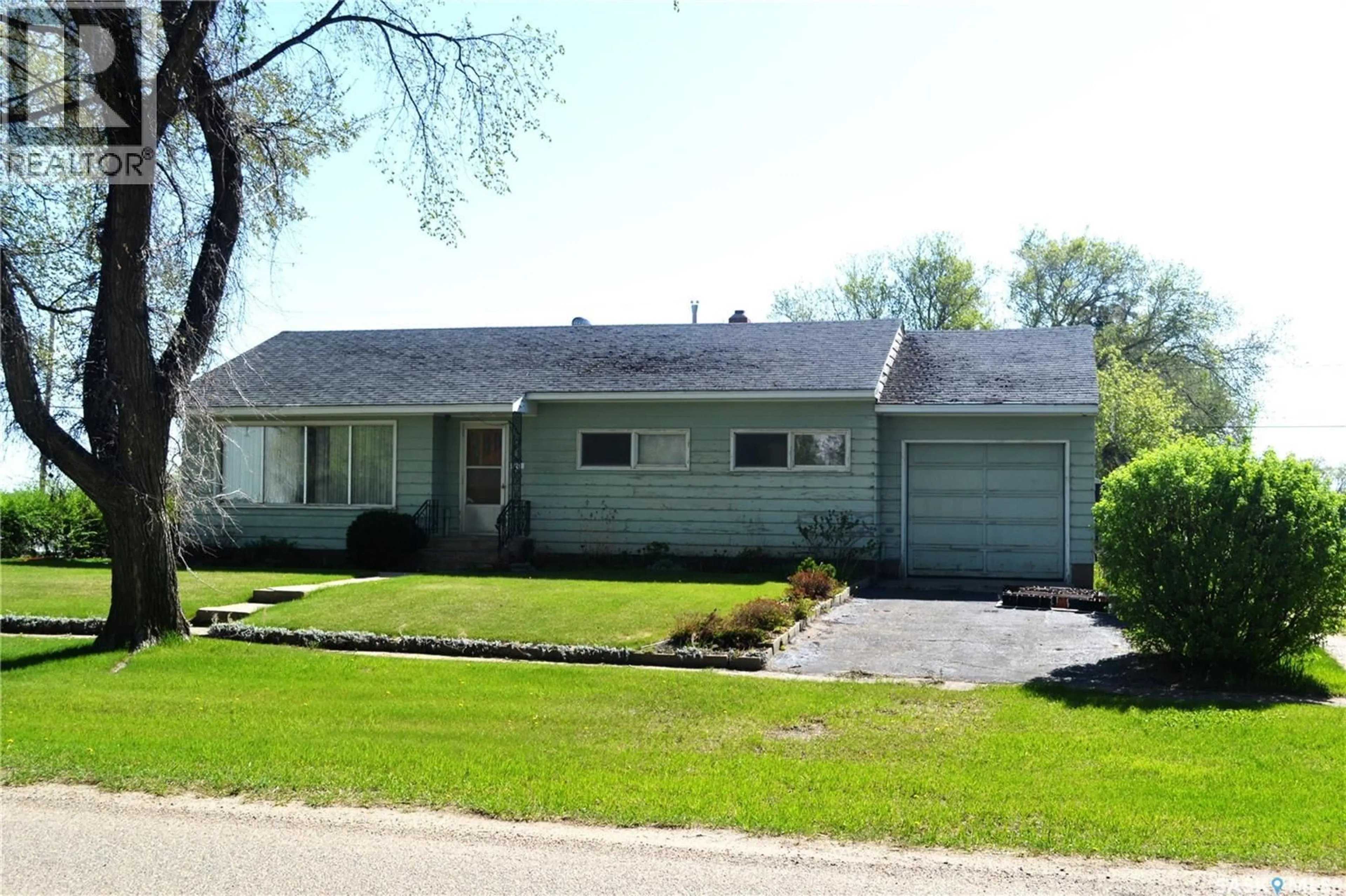 Home with vinyl exterior material, street for 100 MAIN STREET, Radisson Saskatchewan S0K3L0