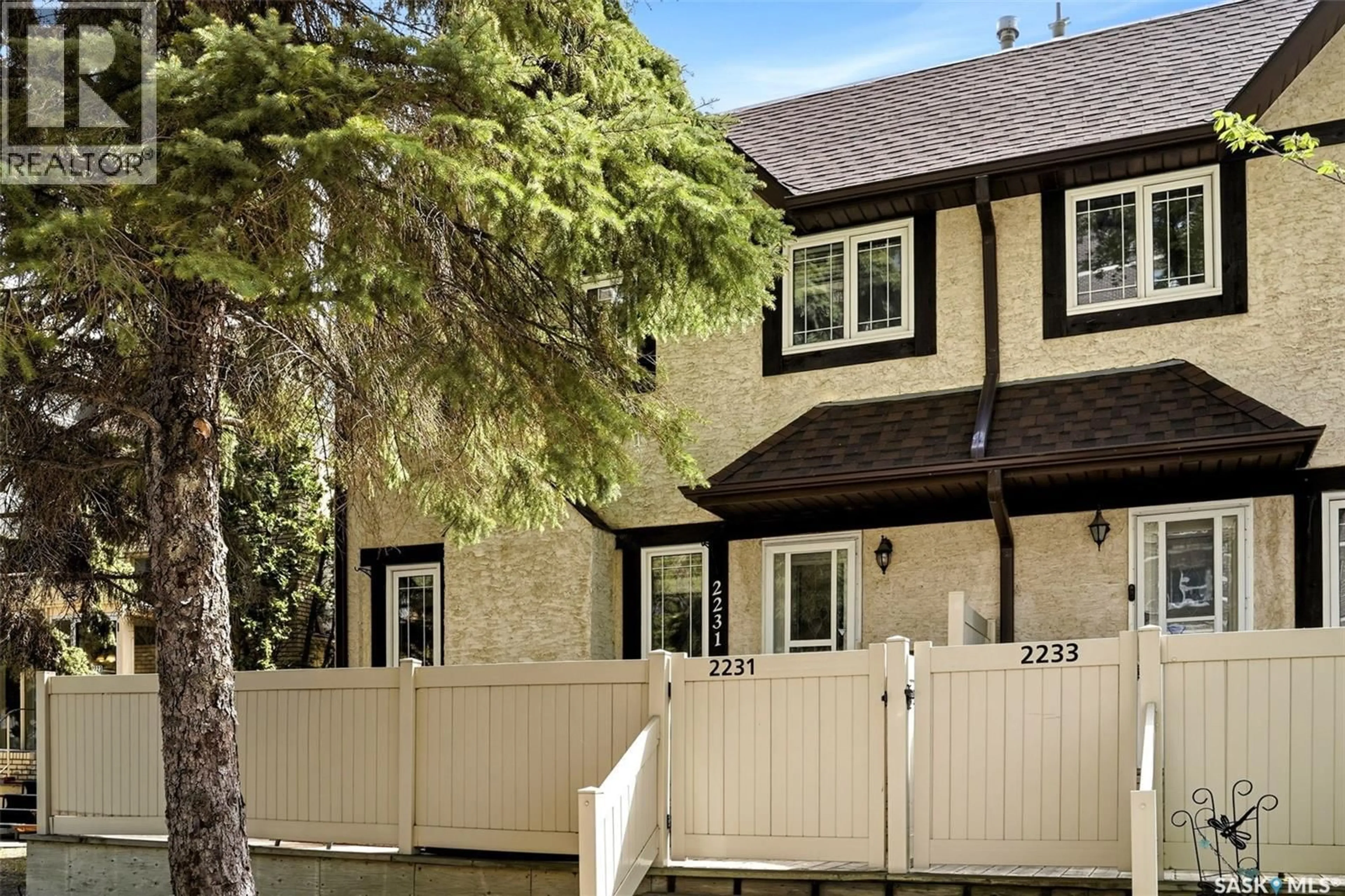 Home with vinyl exterior material, street for 2231 MCINTYRE STREET, Regina Saskatchewan S4P2S1