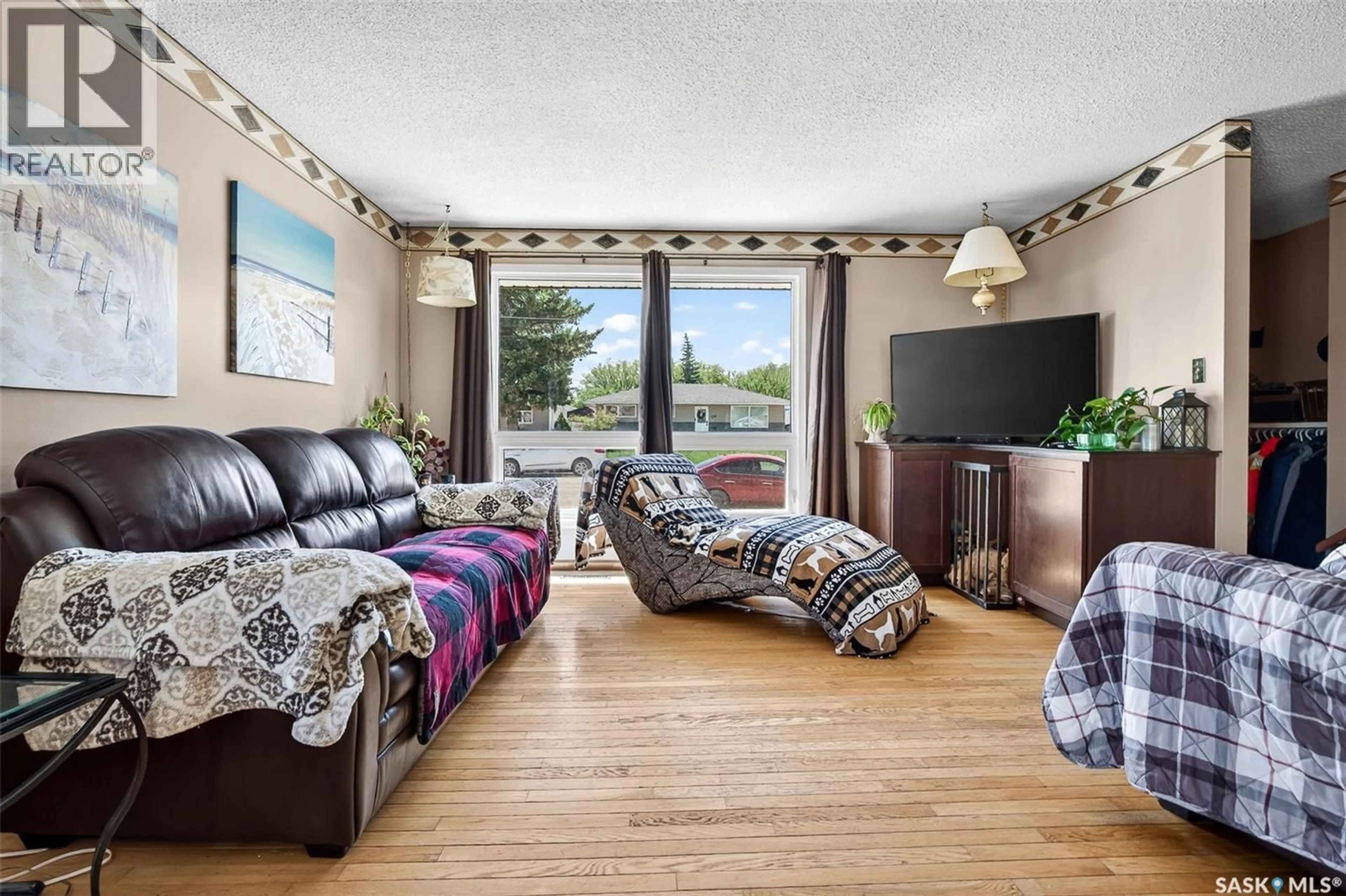 Living room with furniture, unknown for 1050 SIMCOE STREET, Moose Jaw Saskatchewan S6H3J2