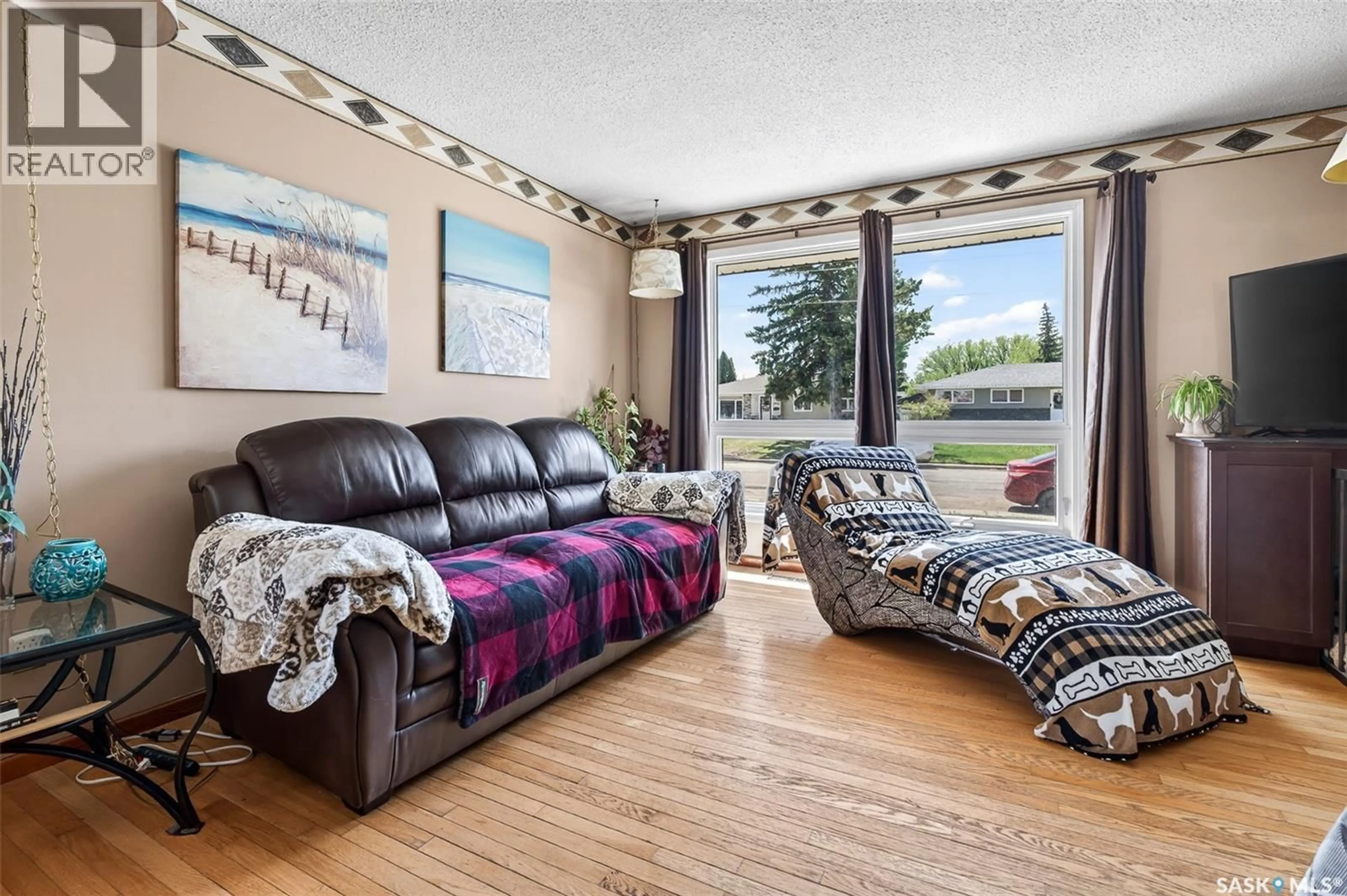 Living room with furniture, unknown for 1050 SIMCOE STREET, Moose Jaw Saskatchewan S6H3J2