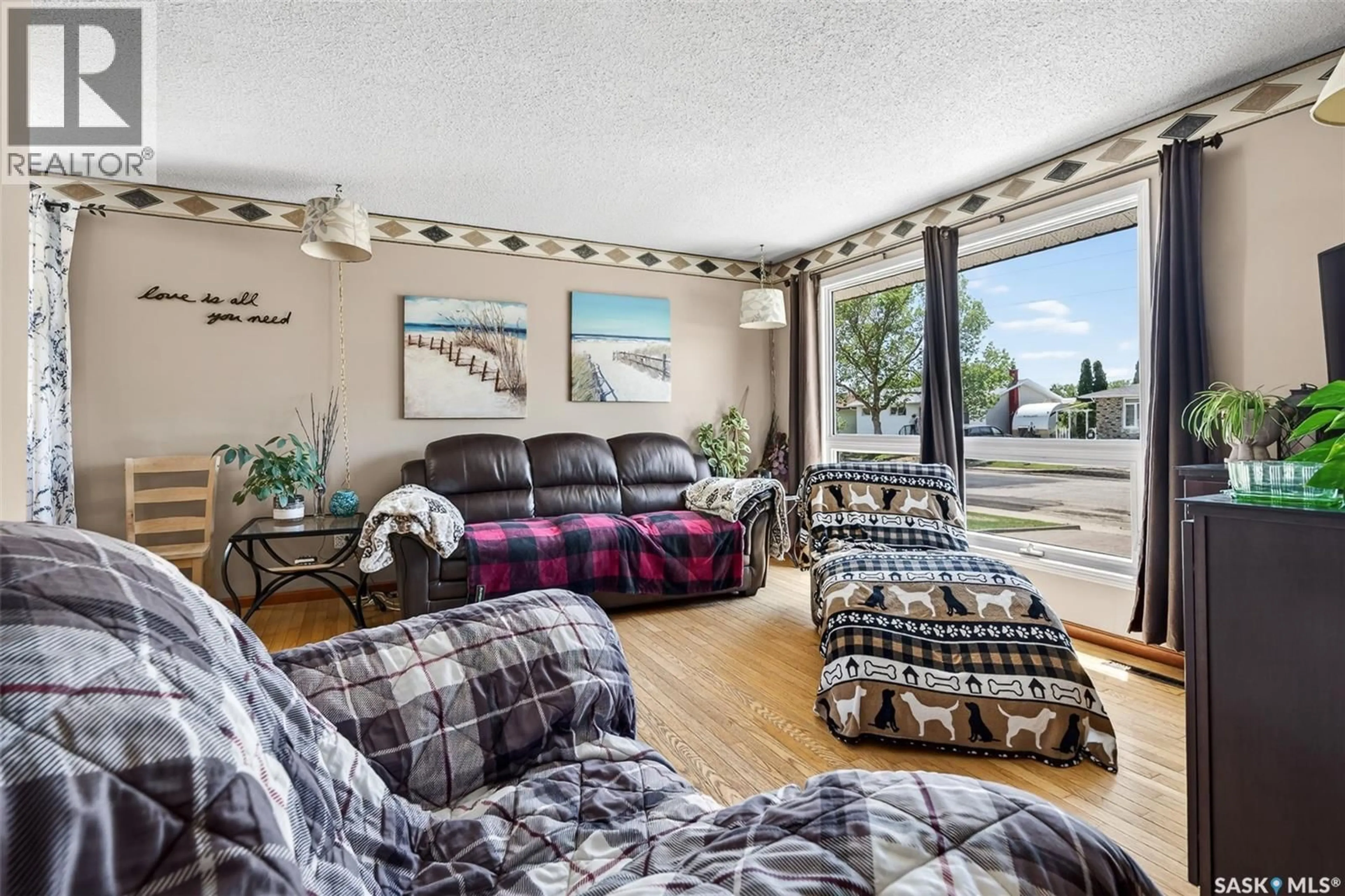 Living room with furniture, unknown for 1050 SIMCOE STREET, Moose Jaw Saskatchewan S6H3J2