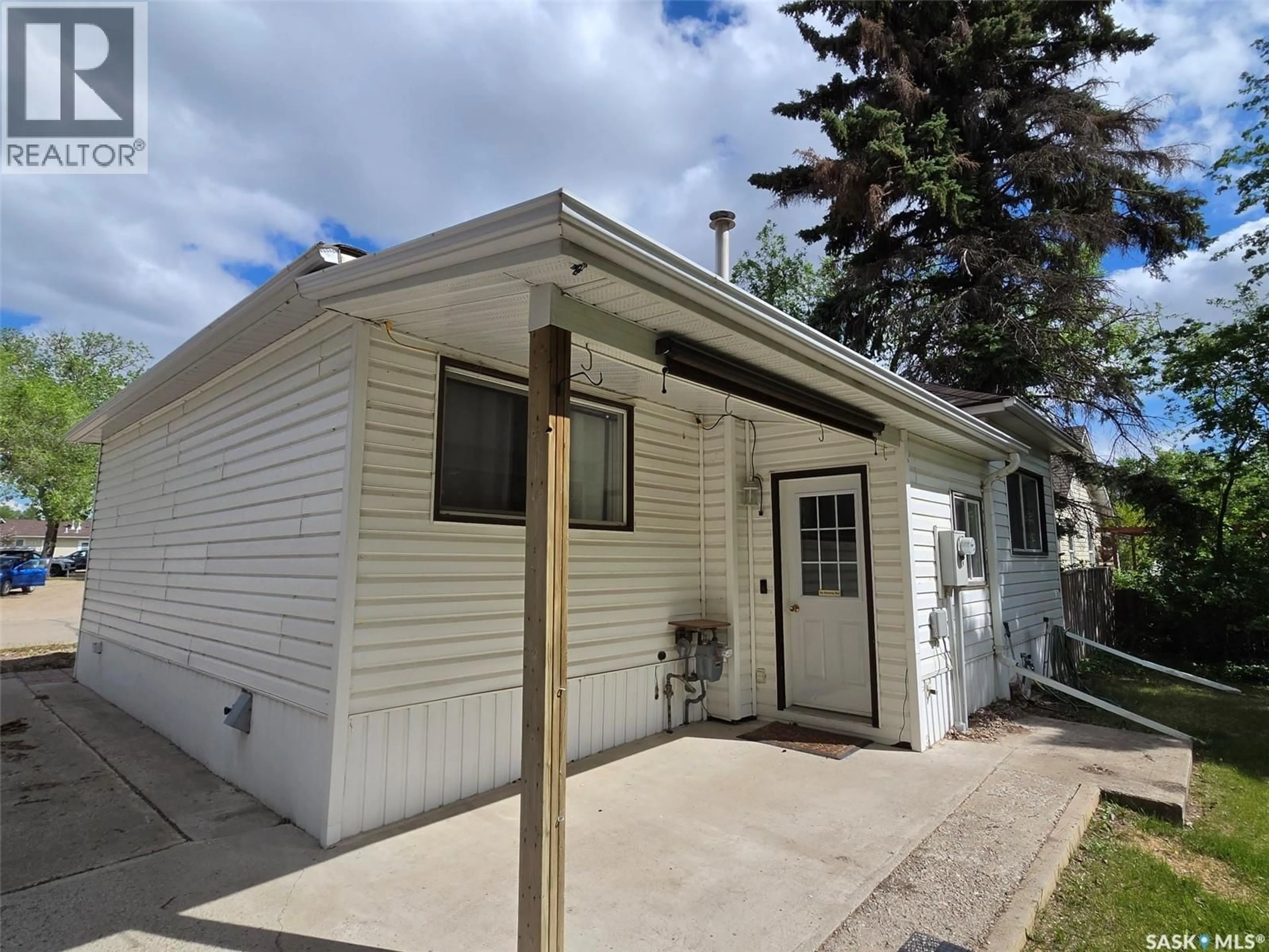 Home with vinyl exterior material, street for 118 5TH STREET, Carlyle Saskatchewan S0C0R0
