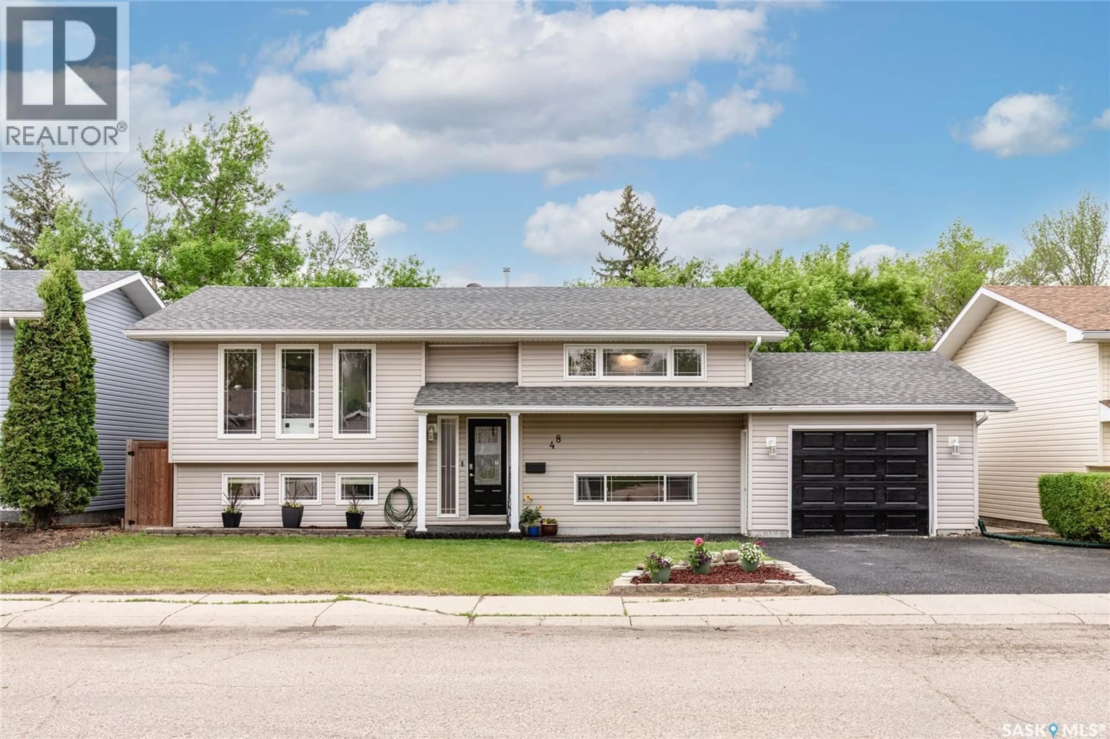 Home with brick exterior material, street for 48 ASTER CRESCENT, Moose Jaw Saskatchewan S6J1A7