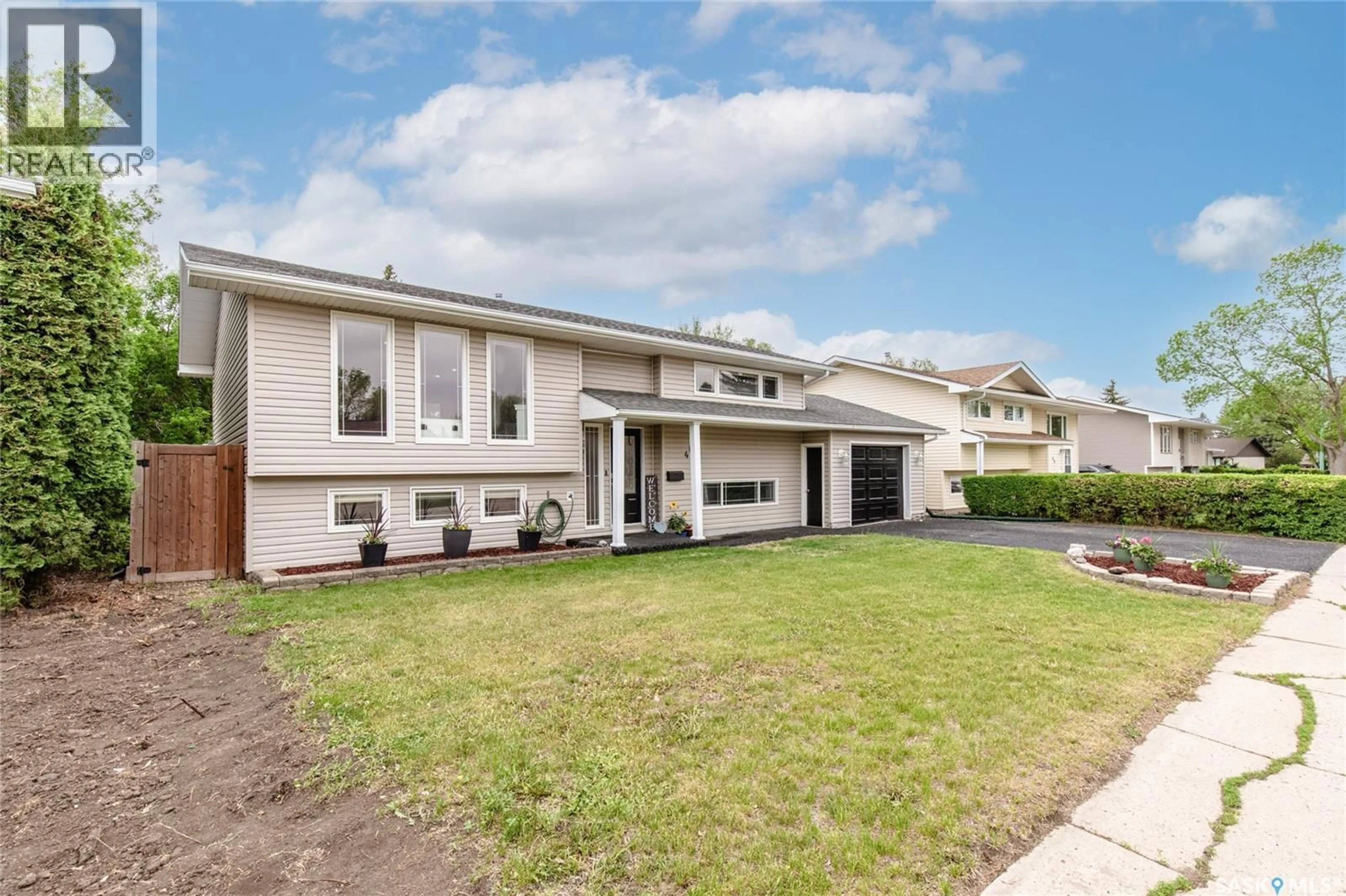Home with vinyl exterior material, street for 48 ASTER CRESCENT, Moose Jaw Saskatchewan S6J1A7