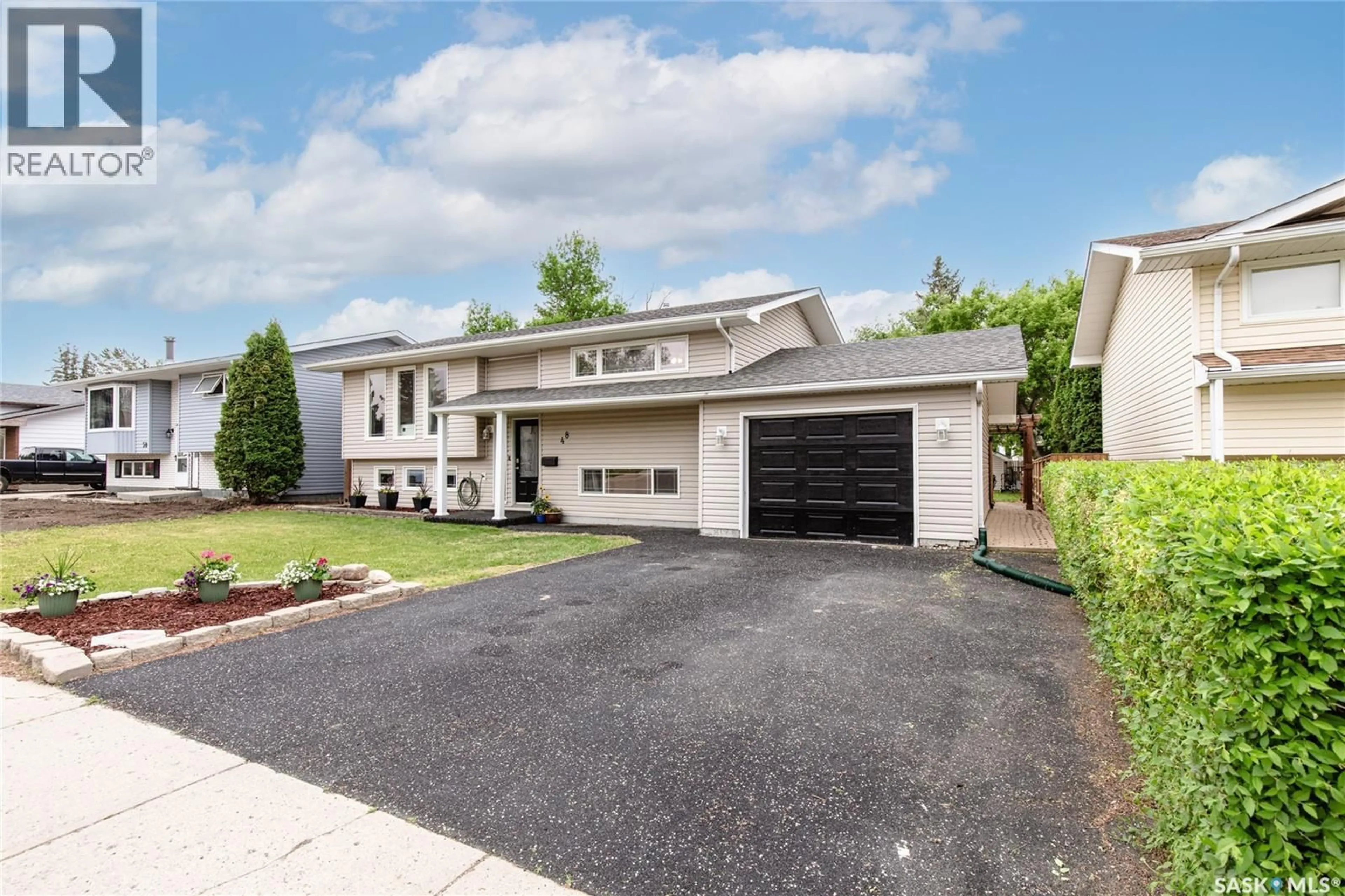 Home with vinyl exterior material, street for 48 ASTER CRESCENT, Moose Jaw Saskatchewan S6J1A7
