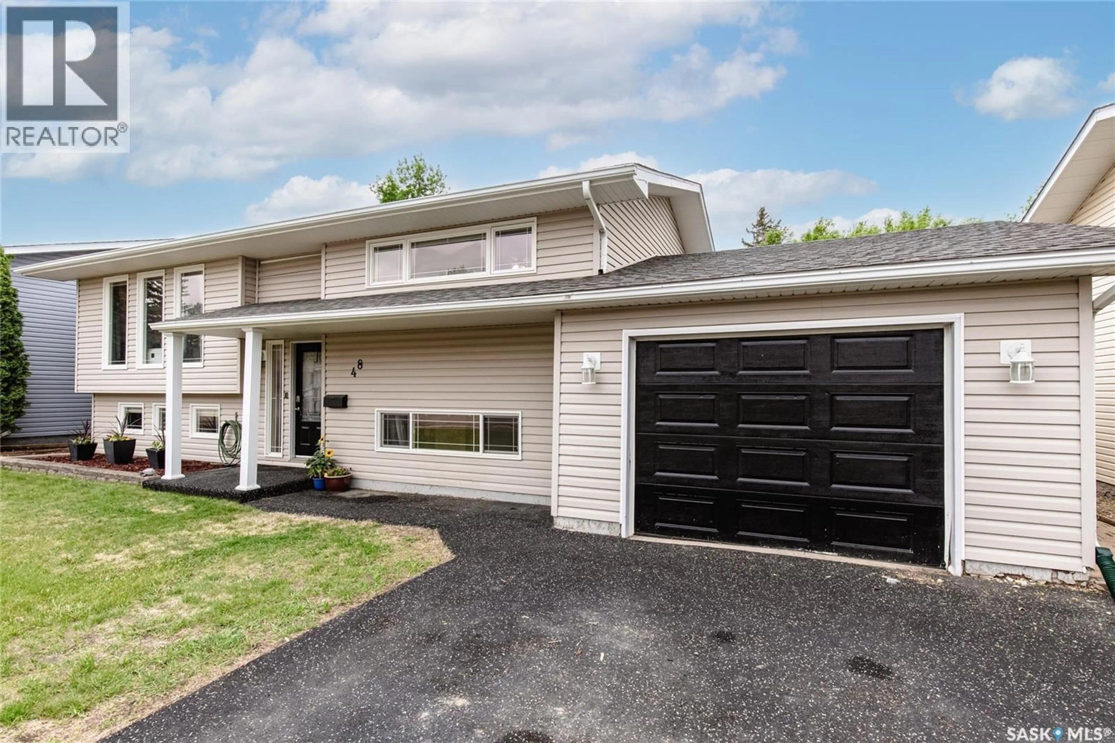 Home with vinyl exterior material, street for 48 ASTER CRESCENT, Moose Jaw Saskatchewan S6J1A7