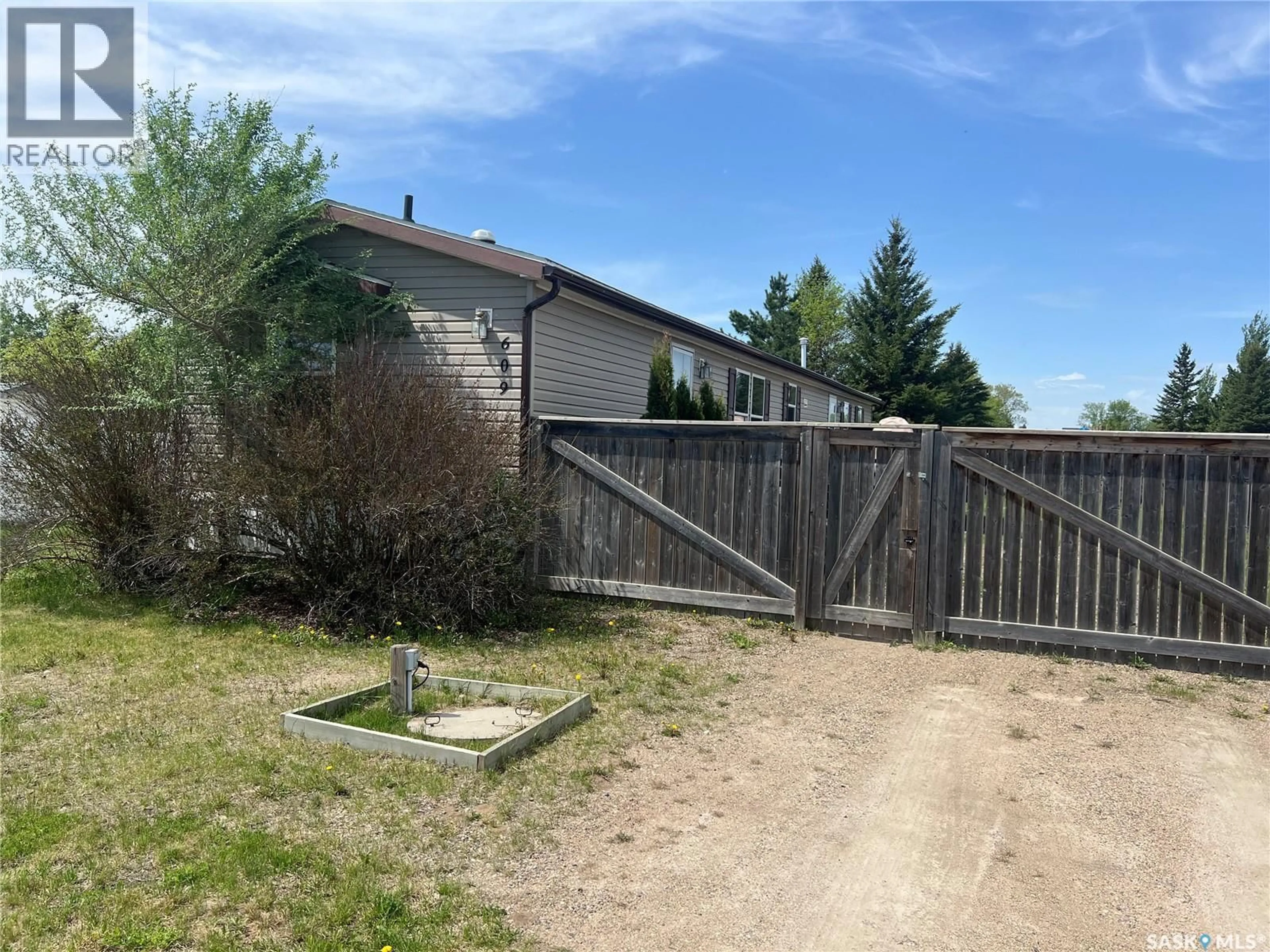 A pic from outside/outdoor area/front of a property/back of a property/a pic from drone, street for 609 6TH STREET, Meadow Lake Saskatchewan S9X1X9