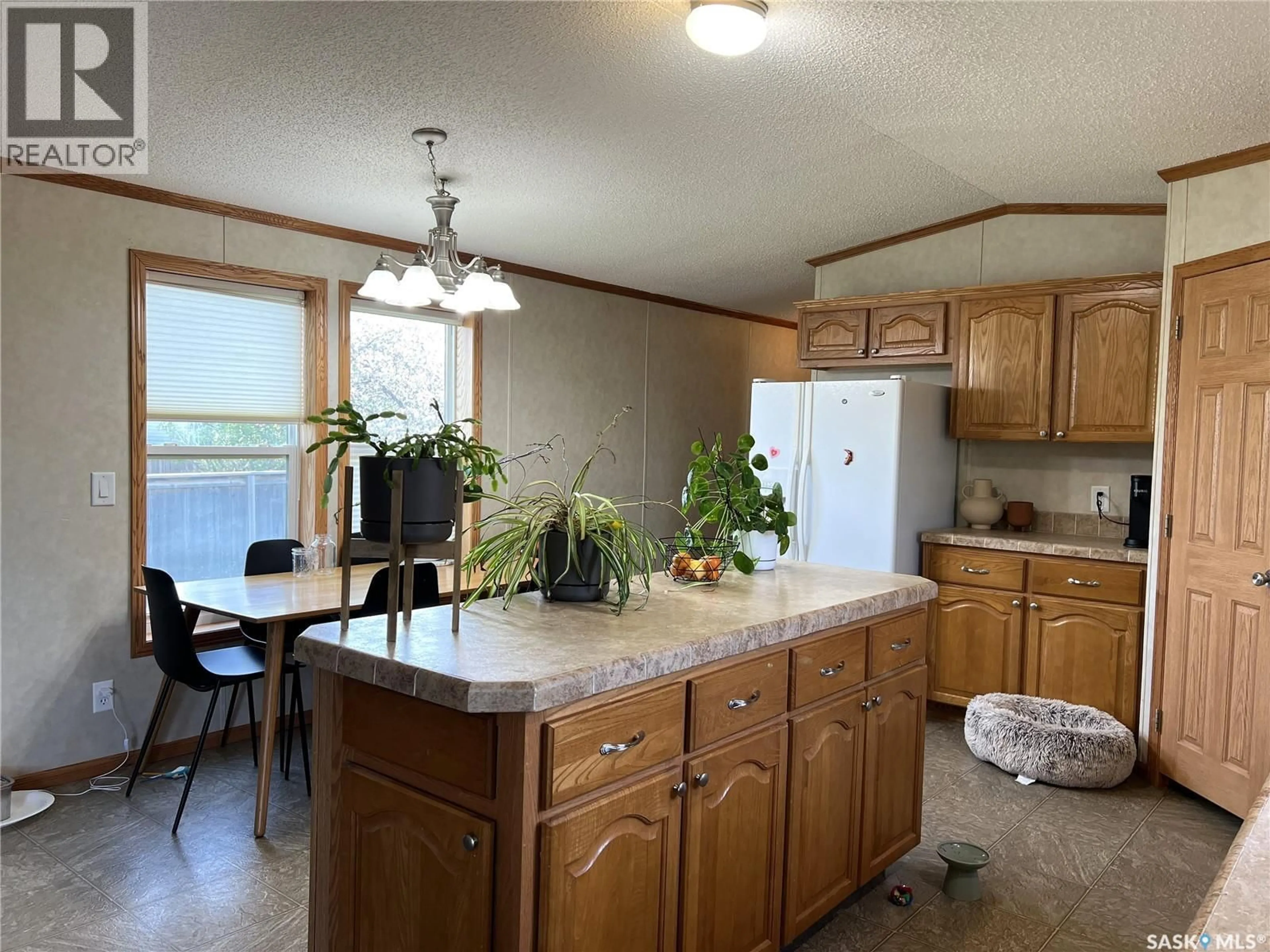 Open concept kitchen, unknown for 609 6TH STREET, Meadow Lake Saskatchewan S9X1X9