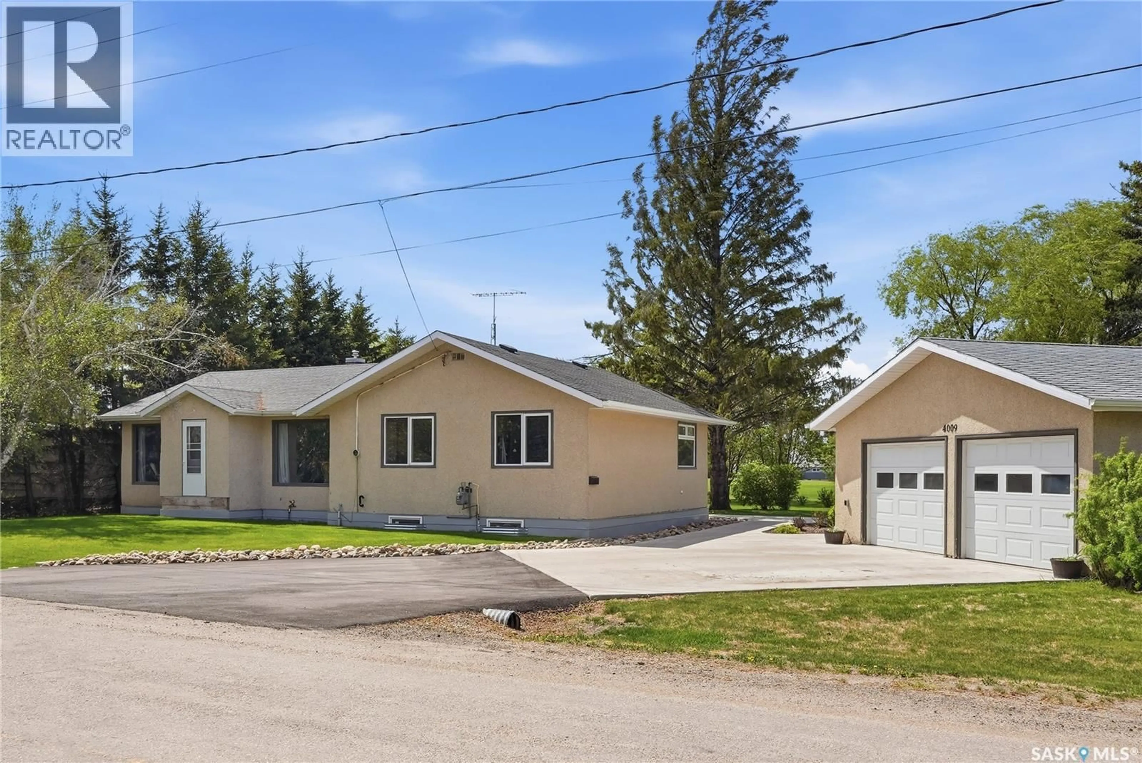 A pic from outside/outdoor area/front of a property/back of a property/a pic from drone, street for 4009 CENTRAL AVENUE, Laird Saskatchewan S0K2H0