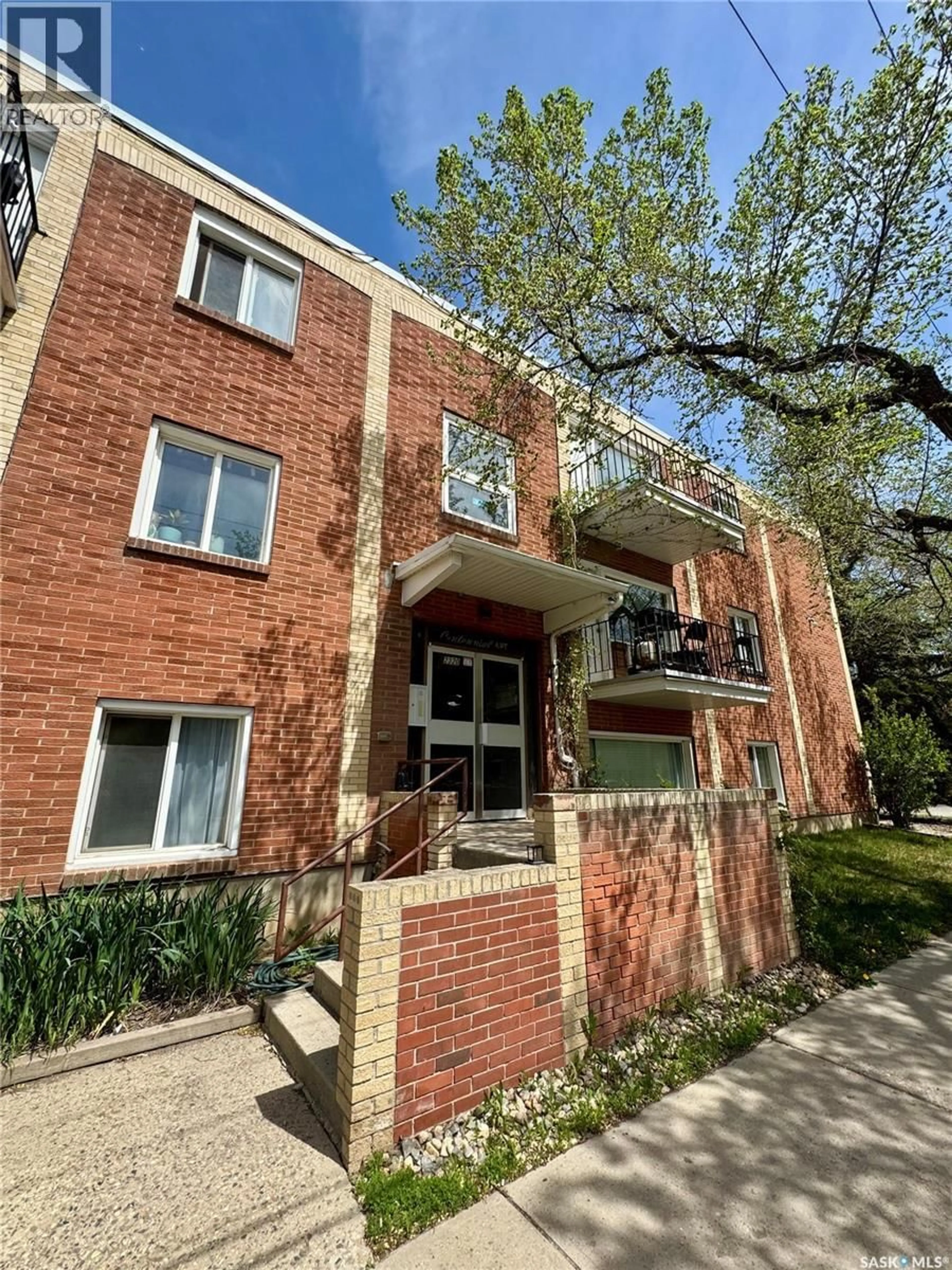 Home with brick exterior material, building for 11 2320 13TH AVENUE, Regina Saskatchewan S4V0V7