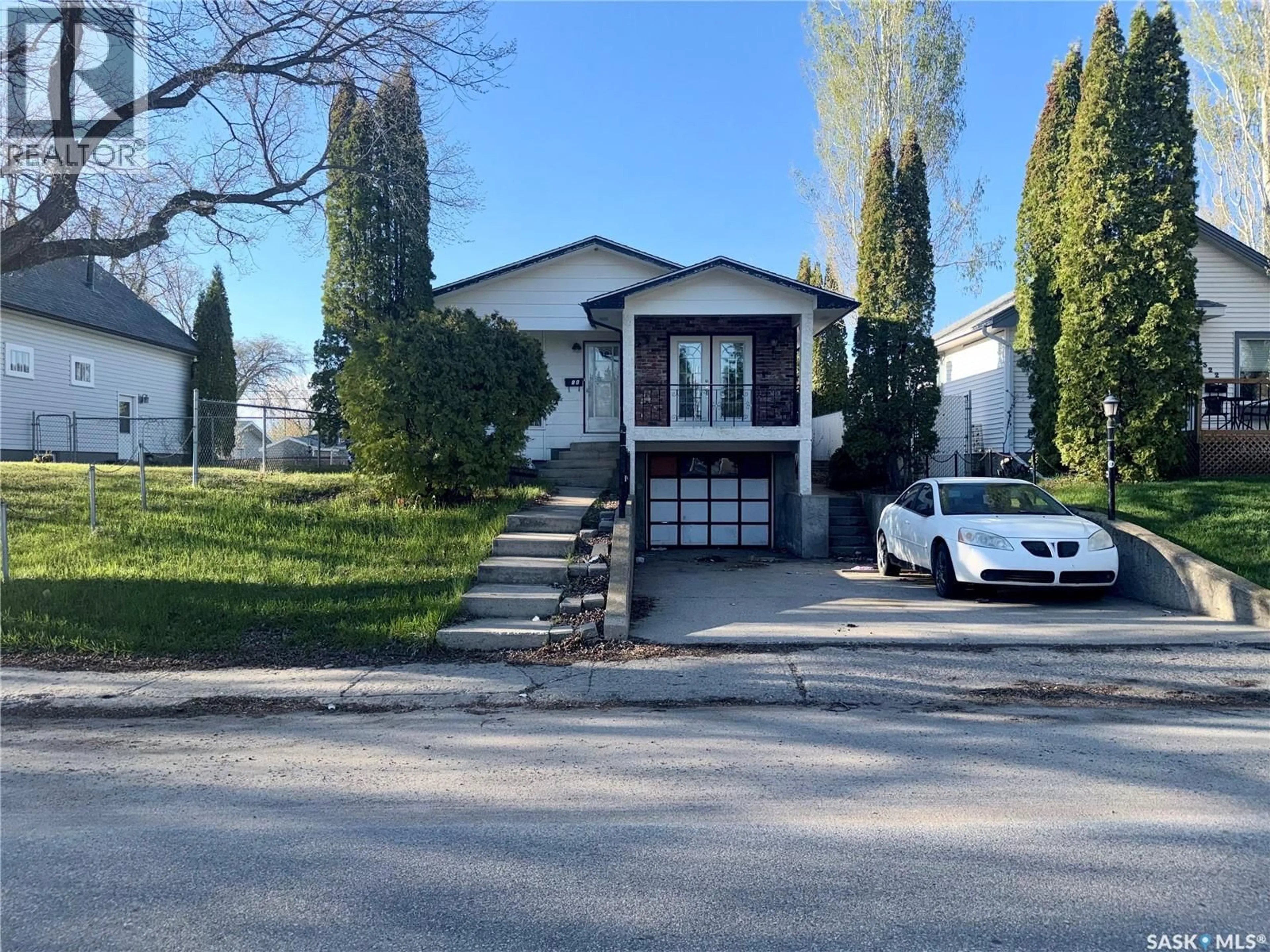Home with vinyl exterior material, street for 318 25TH STREET, Prince Albert Saskatchewan S6V1T1