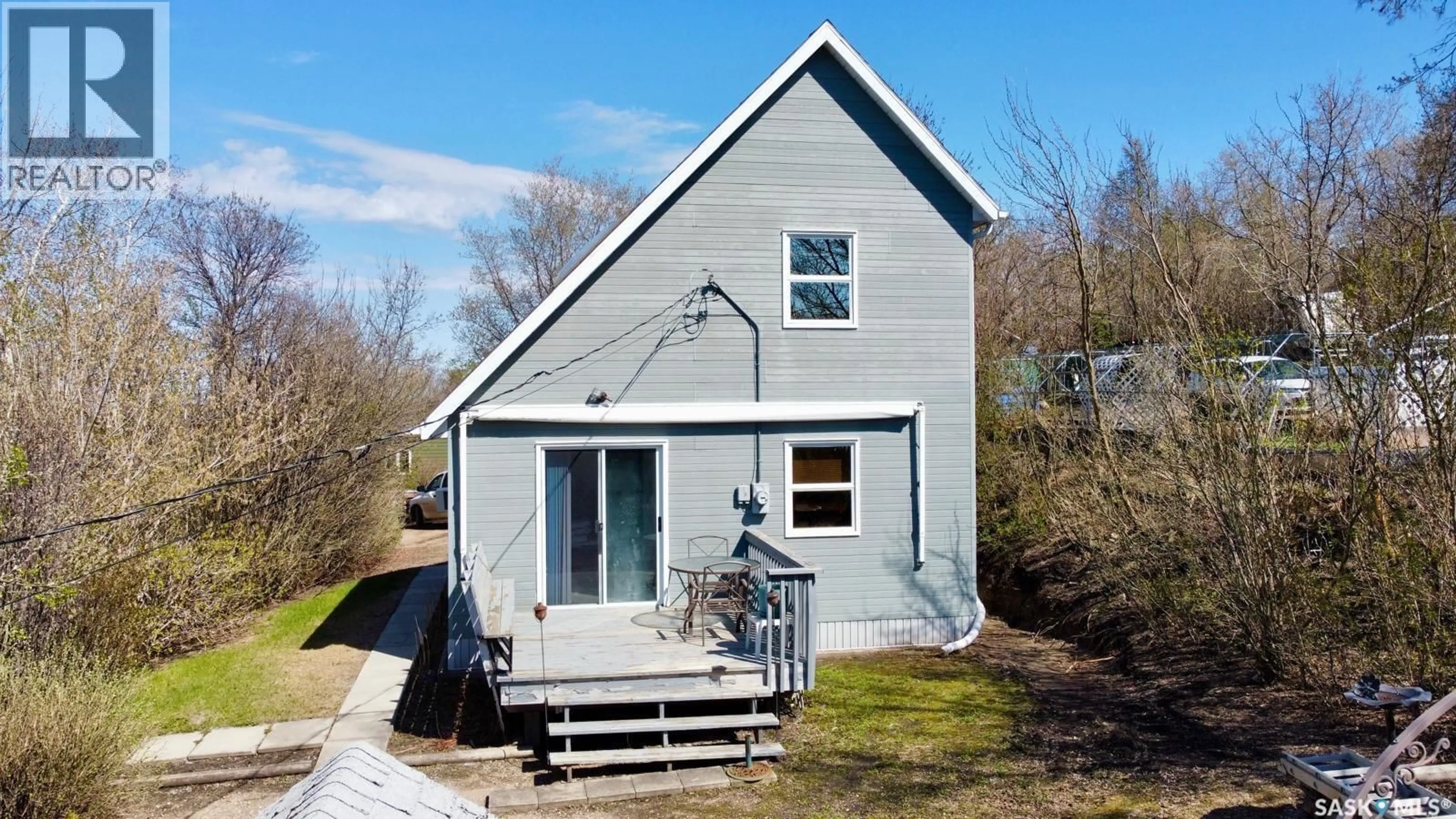A pic from outside/outdoor area/front of a property/back of a property/a pic from drone, unknown for 207 REGINA STREET, Manitou Beach Saskatchewan S0K4T1