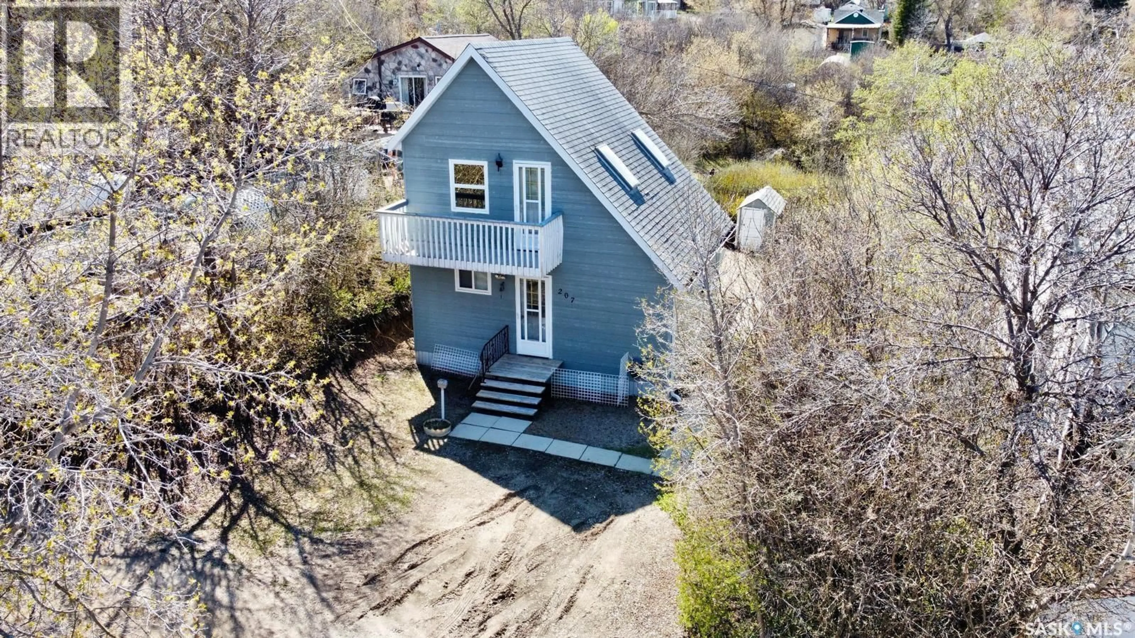 A pic from outside/outdoor area/front of a property/back of a property/a pic from drone, street for 207 REGINA STREET, Manitou Beach Saskatchewan S0K4T1