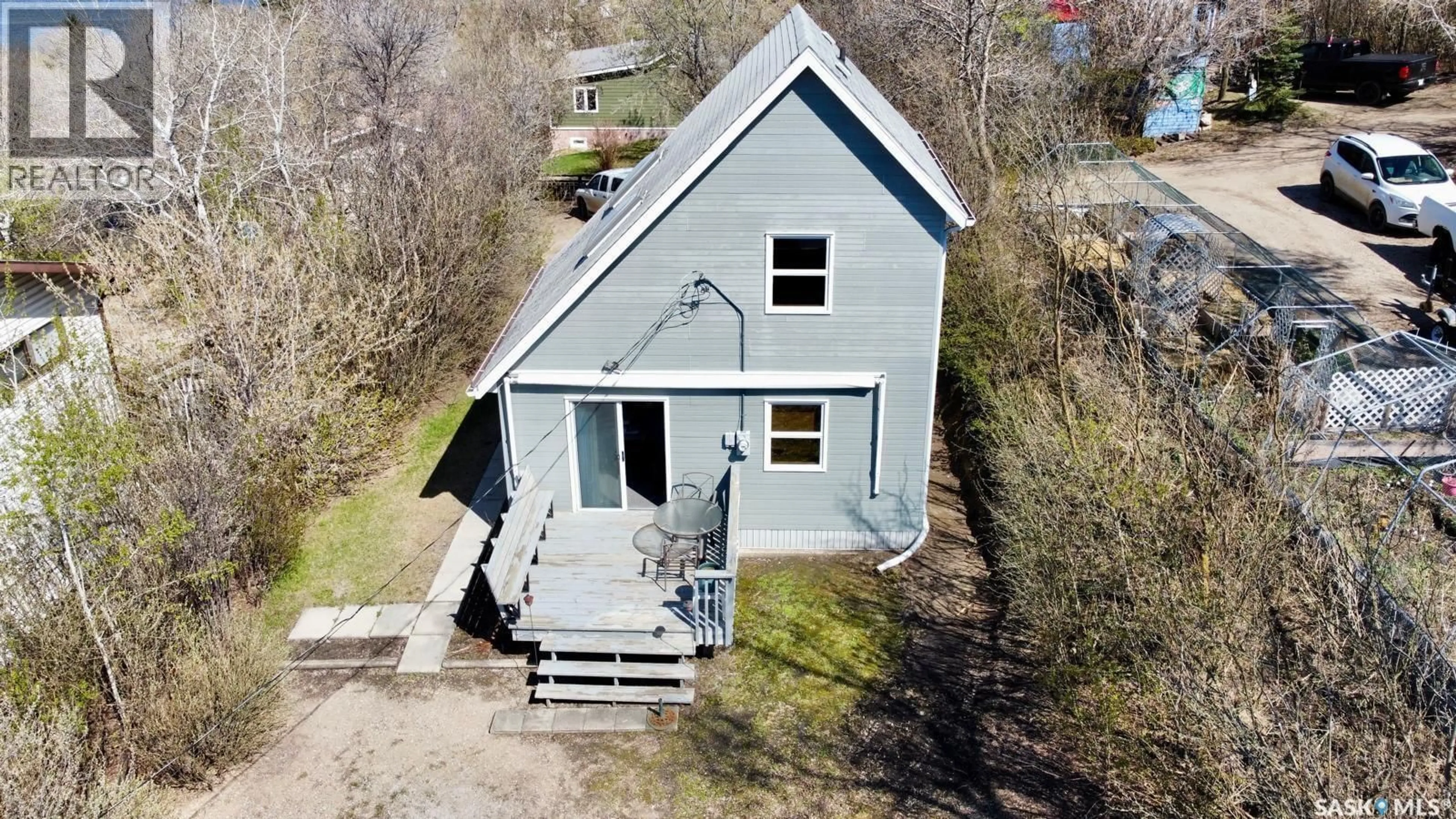 A pic from outside/outdoor area/front of a property/back of a property/a pic from drone, building for 207 REGINA STREET, Manitou Beach Saskatchewan S0K4T1
