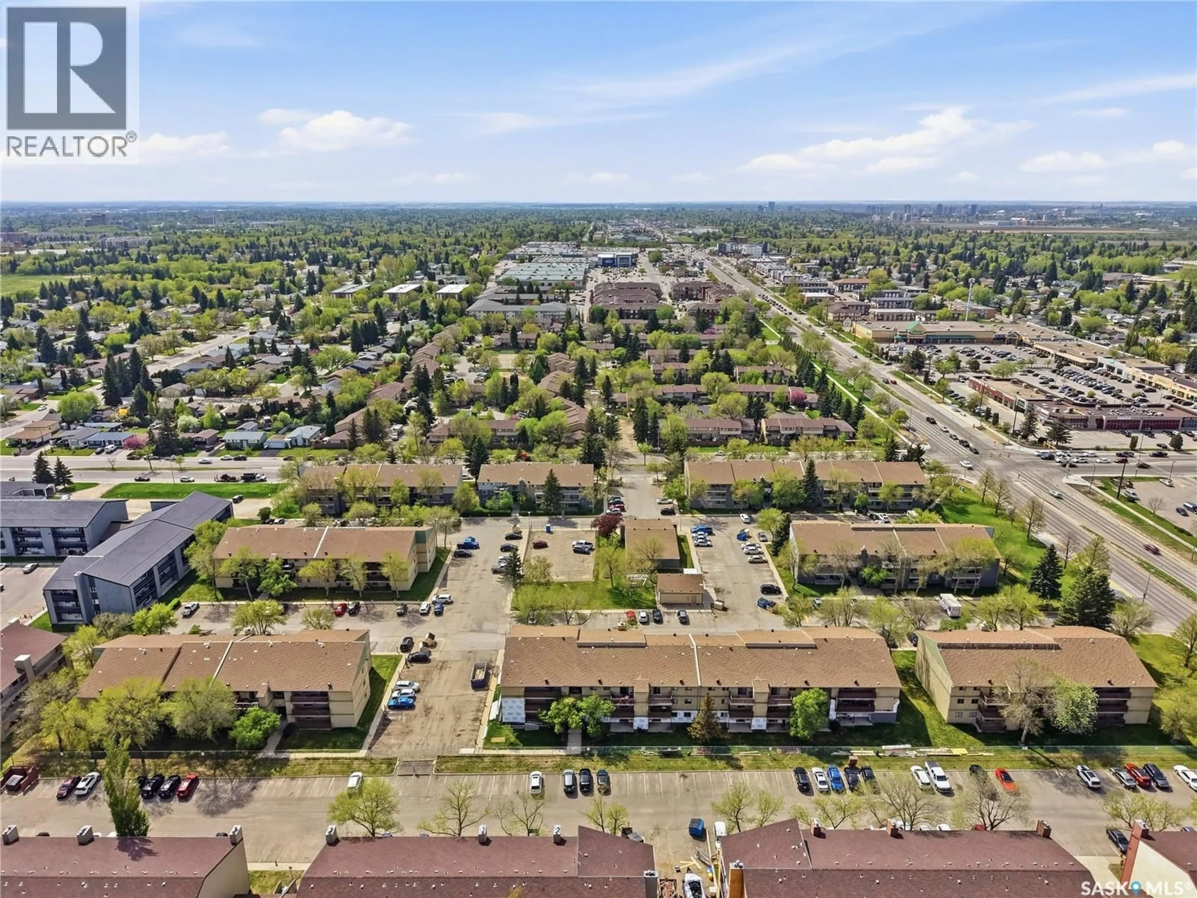 A pic from outside/outdoor area/front of a property/back of a property/a pic from drone, street for 201D2 - 1121 MCKERCHER DRIVE, Saskatoon Saskatchewan S7H5B8