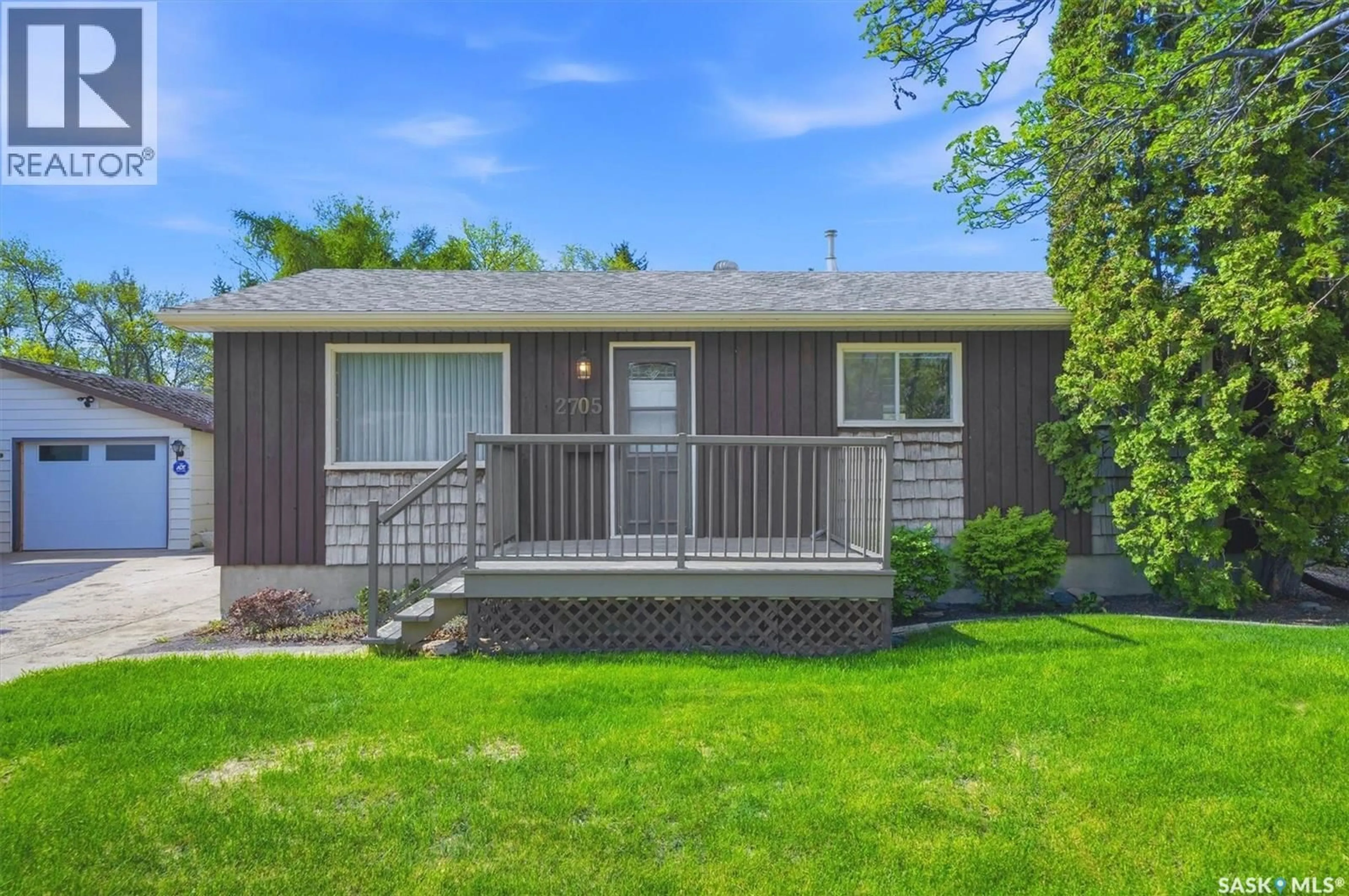Home with vinyl exterior material, street for 2705 37TH STREET, Saskatoon Saskatchewan S7L4E9