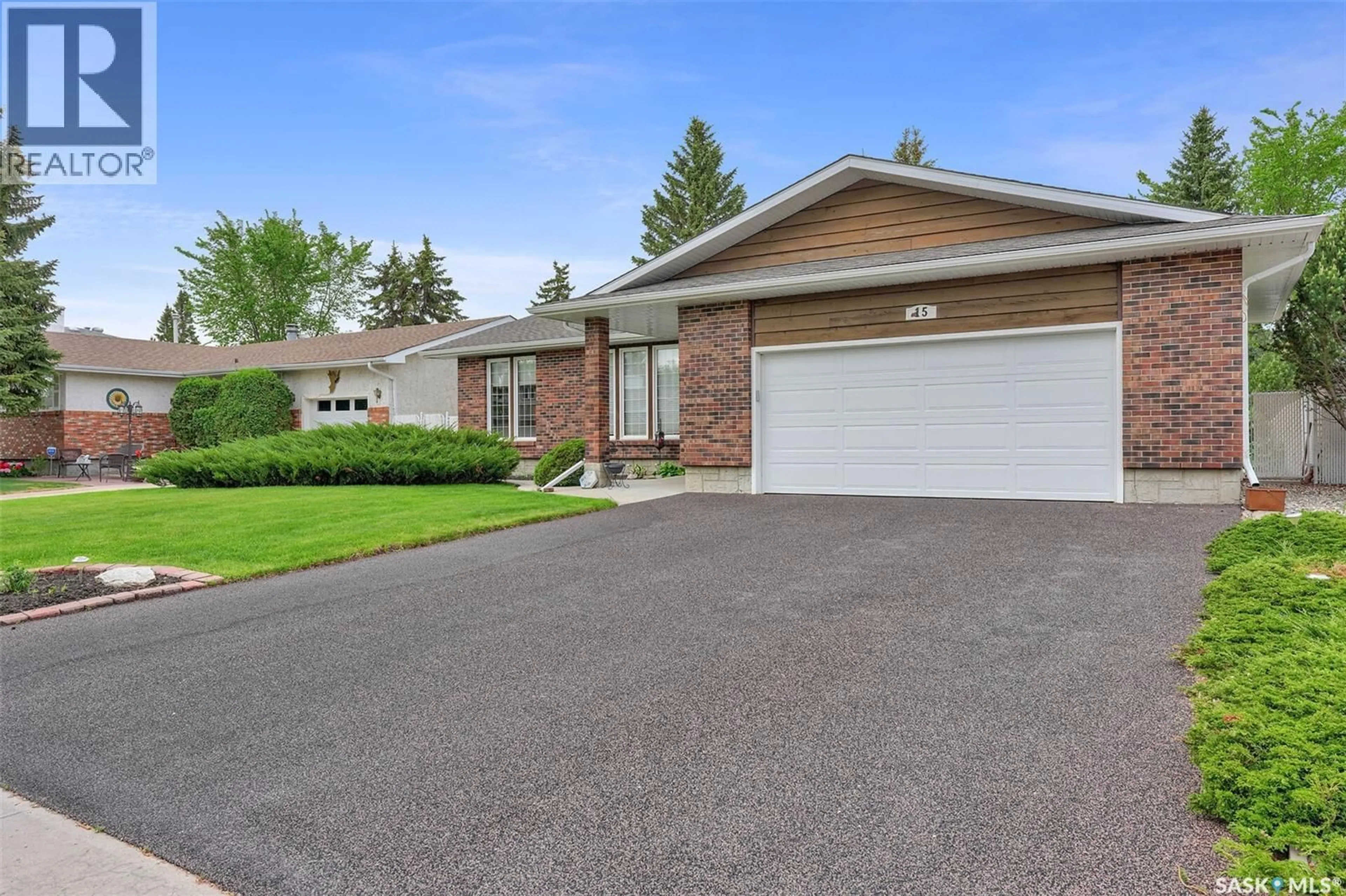 Home with vinyl exterior material, street for 15 DALHOUSIE WAY, Regina Saskatchewan S4V0A1