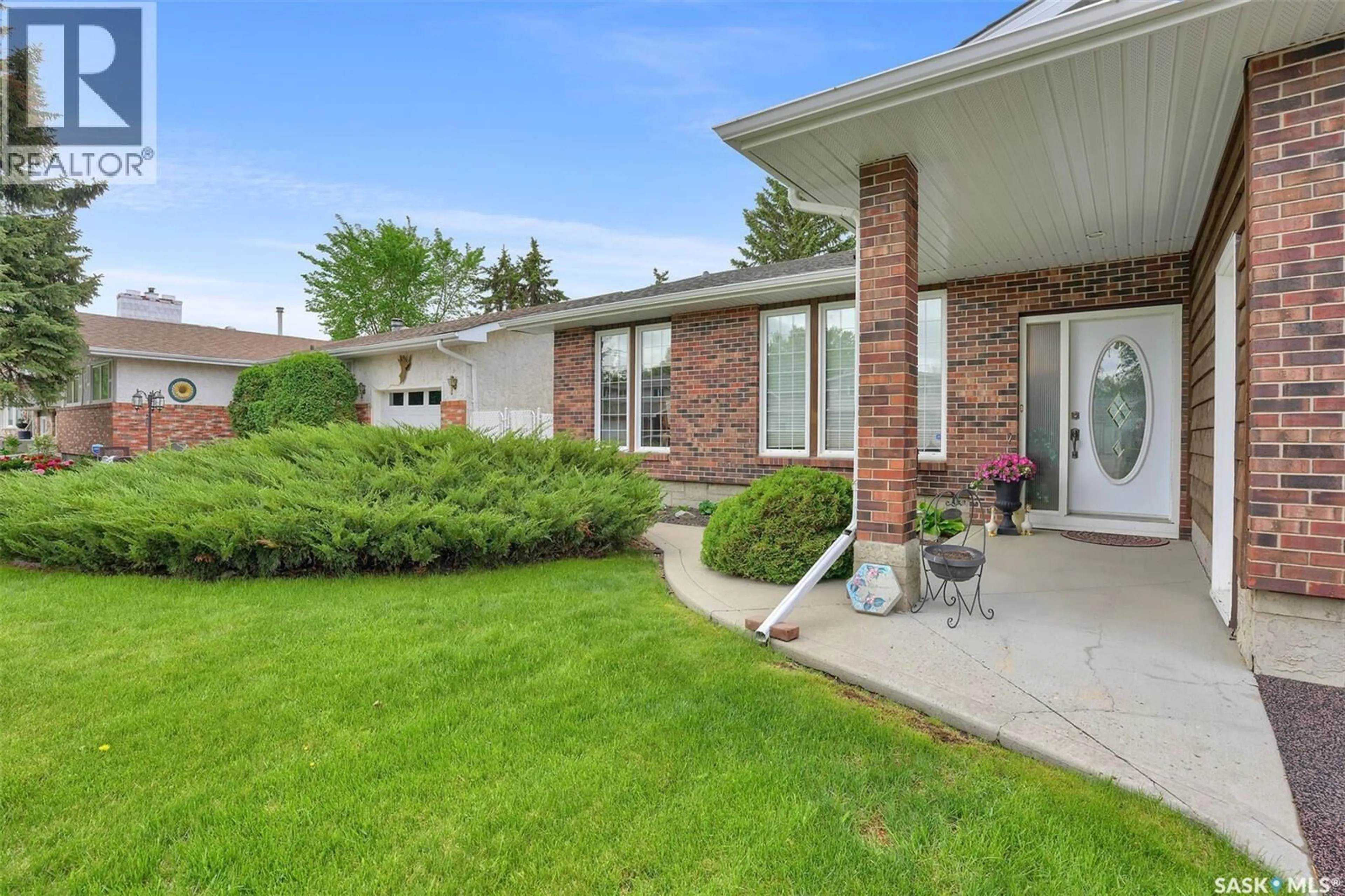 Home with brick exterior material, street for 15 DALHOUSIE WAY, Regina Saskatchewan S4V0A1
