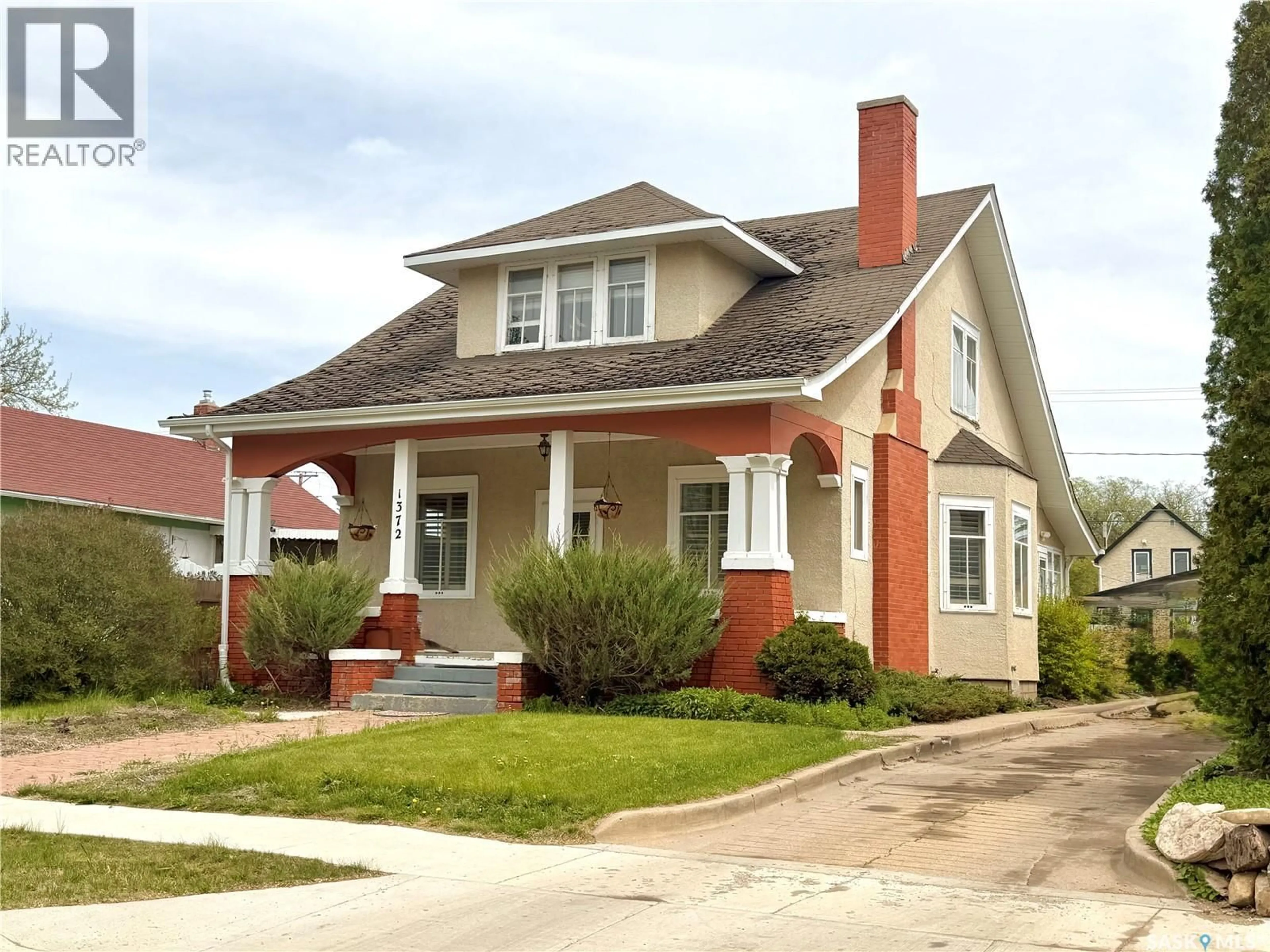 Home with brick exterior material, street for 1372 98TH STREET, North Battleford Saskatchewan S9A0M2