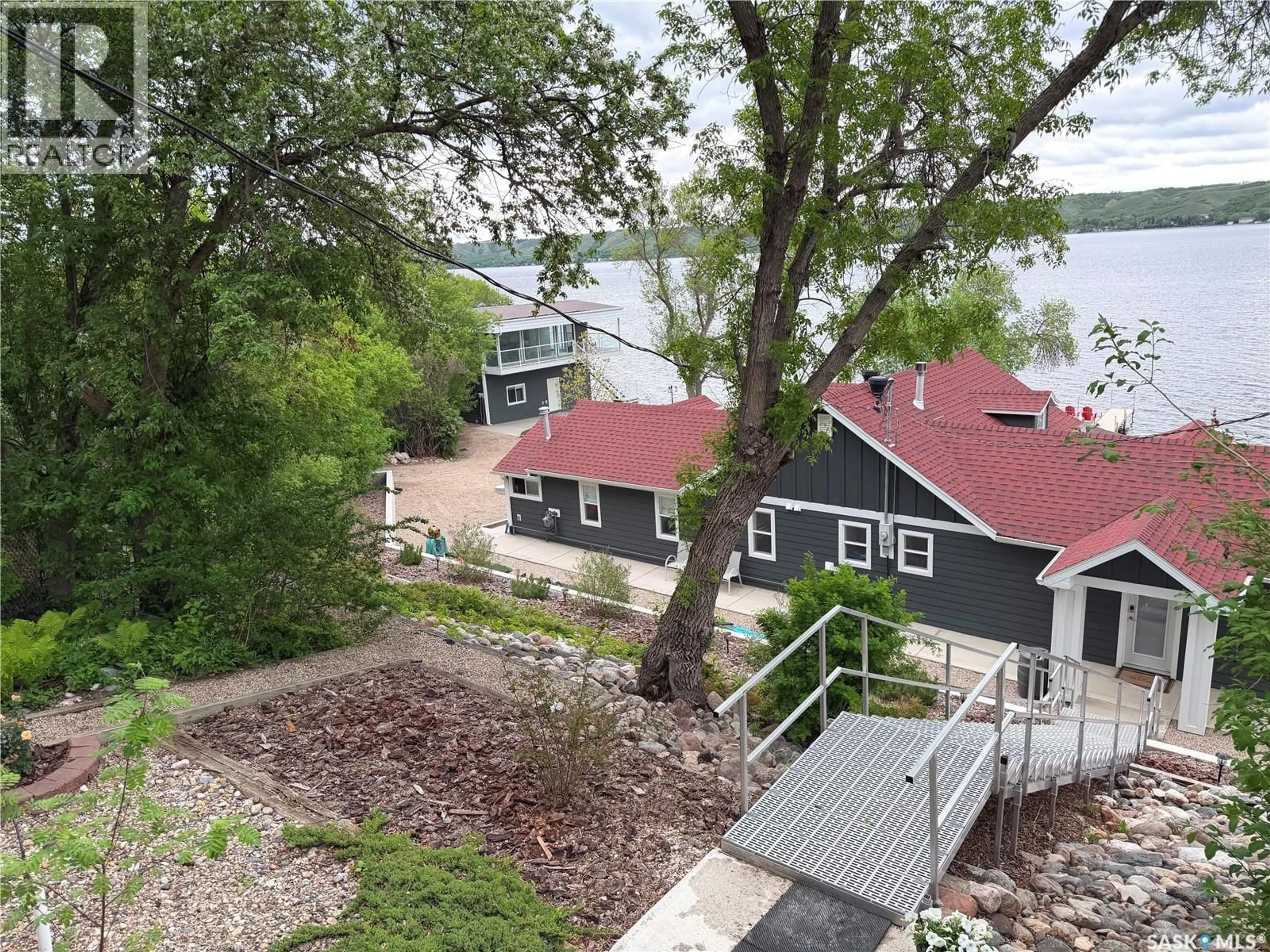 A pic from outside/outdoor area/front of a property/back of a property/a pic from drone, water/lake/river/ocean view for 290 B-SAY-TAH ROAD, B-Say-Tah Saskatchewan S0G1S0
