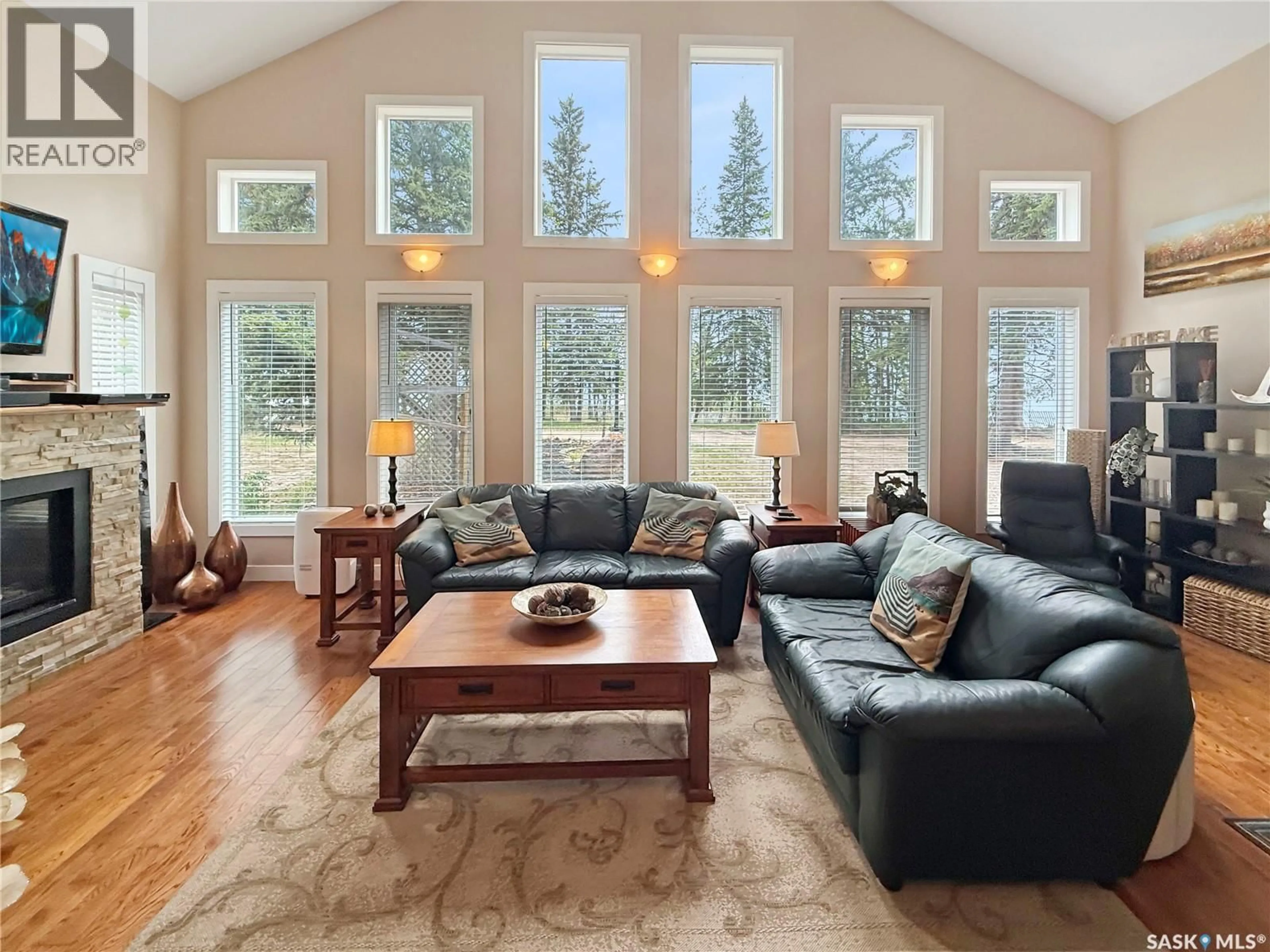 Living room with furniture, wood/laminate floor for 110 LAKESHORE DRIVE, Candle Lake Saskatchewan S0J3E0