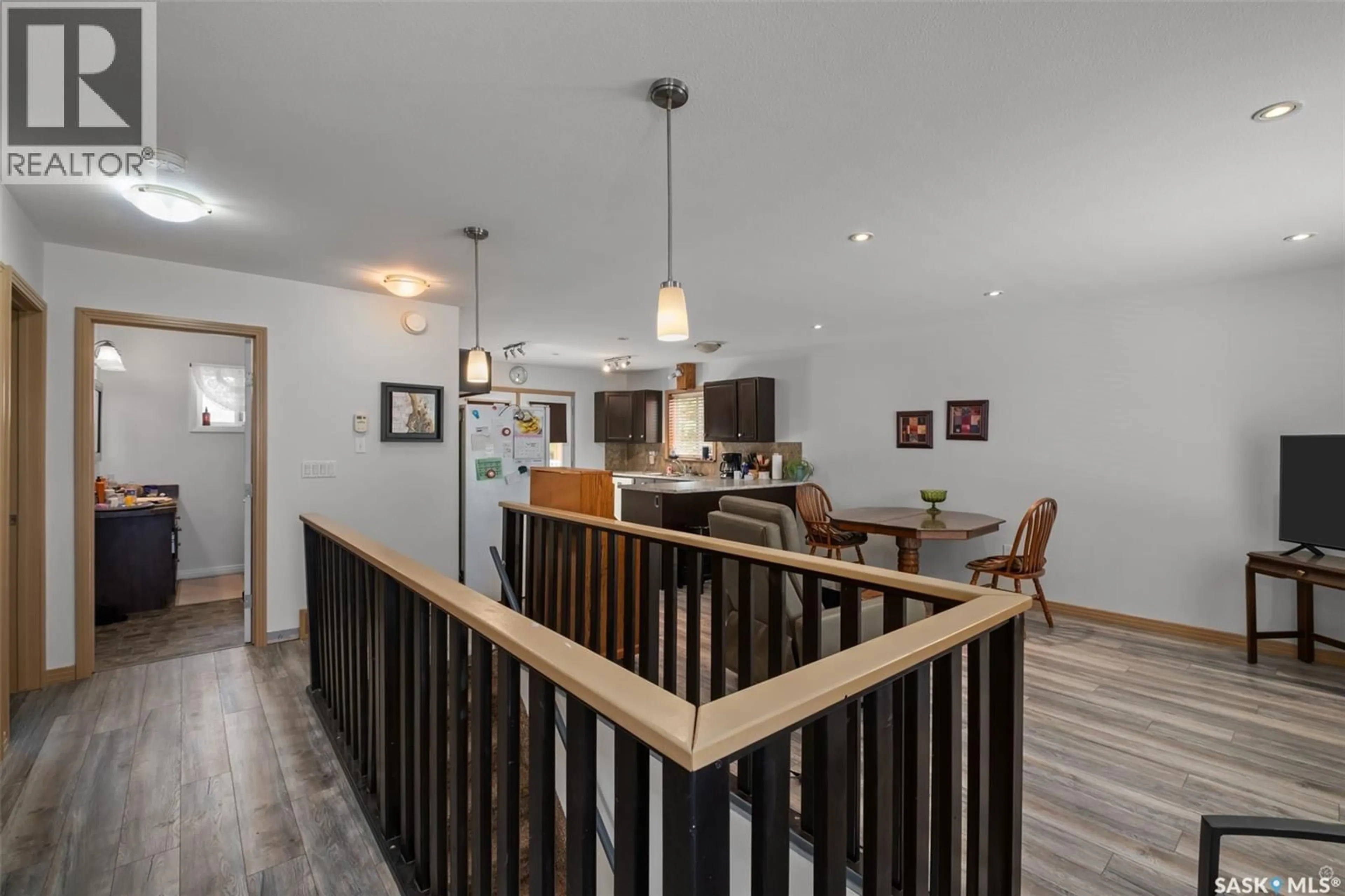 Open concept kitchen, wood/laminate floor for 441 6TH STREET, Prince Albert Saskatchewan S6V0N3