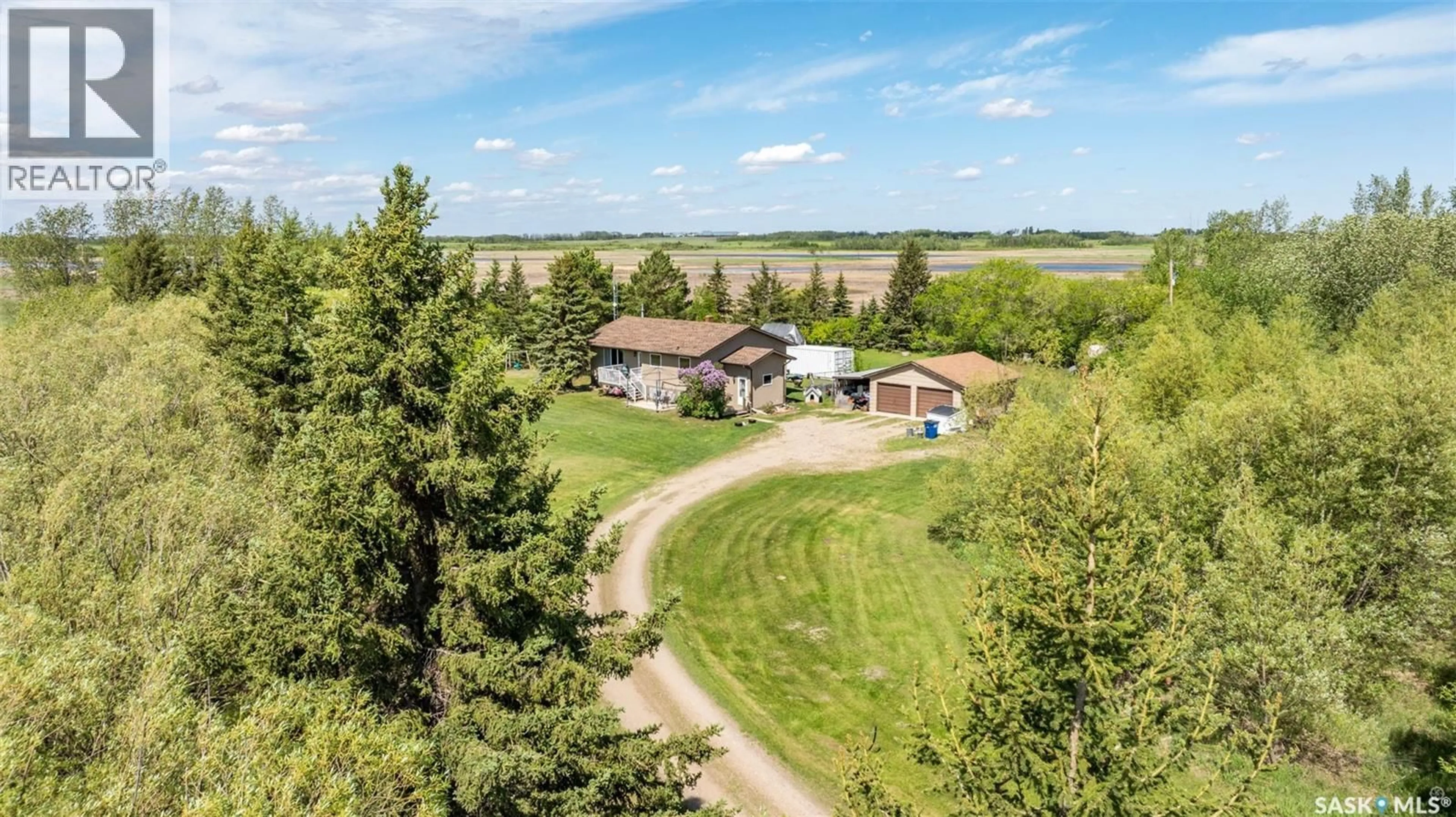 A pic from outside/outdoor area/front of a property/back of a property/a pic from drone, water/lake/river/ocean view for HOLBEIN ACREAGE, Shellbrook Rm No. 493 Saskatchewan S0J2E0