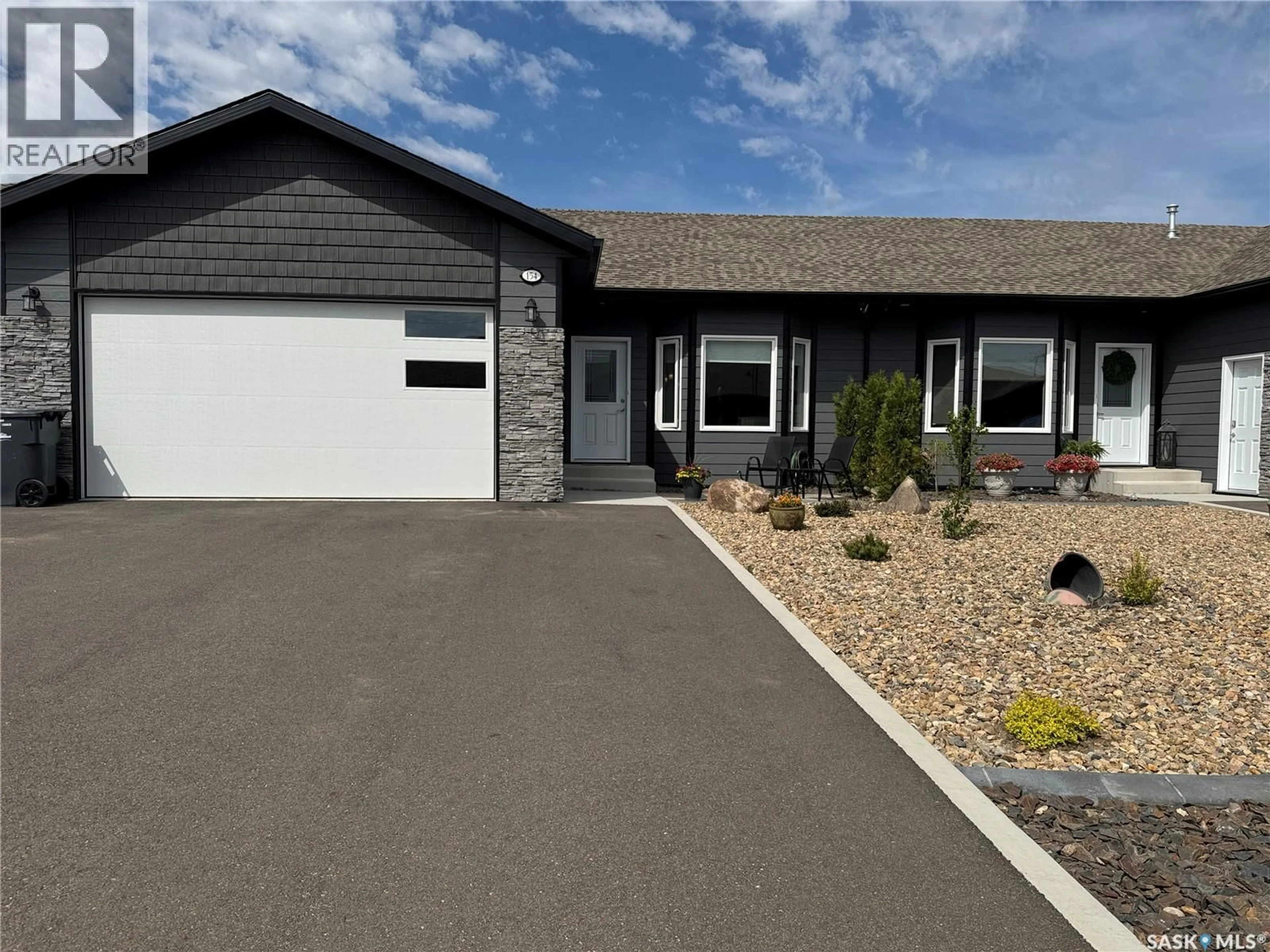 Home with vinyl exterior material, street for 154 HERITAGE LANDING CRESCENT, Battleford Saskatchewan S0M0E0
