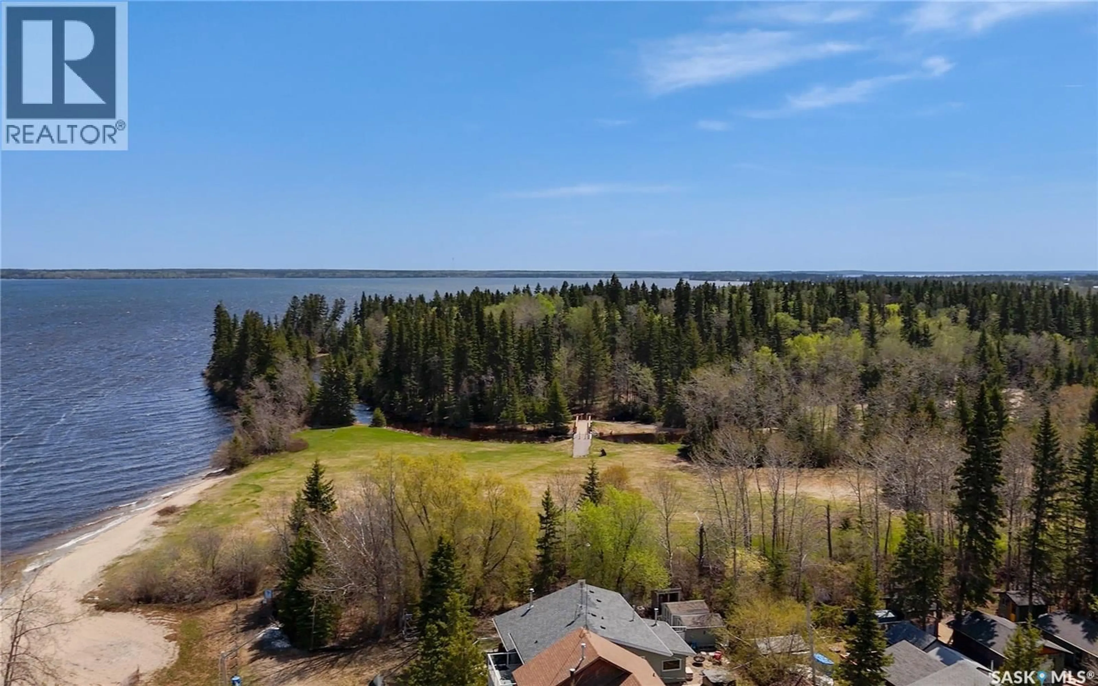 A pic from outside/outdoor area/front of a property/back of a property/a pic from drone, water/lake/river/ocean view for 4 3RD CRESCENT, Candle Lake Saskatchewan S0J3E0