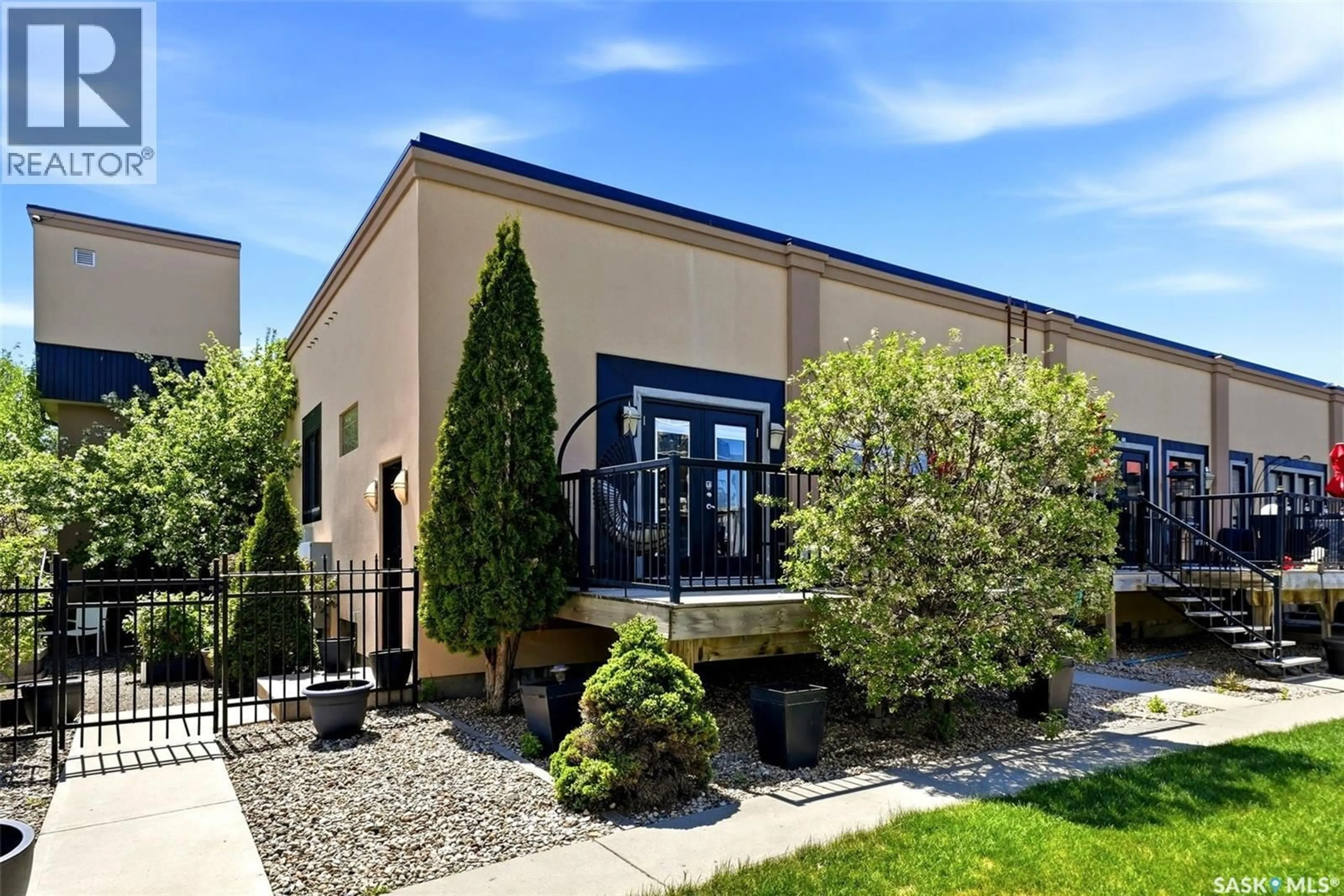 Home with vinyl exterior material, street for 1 - 1324 HALIFAX STREET, Regina Saskatchewan S4R1V1