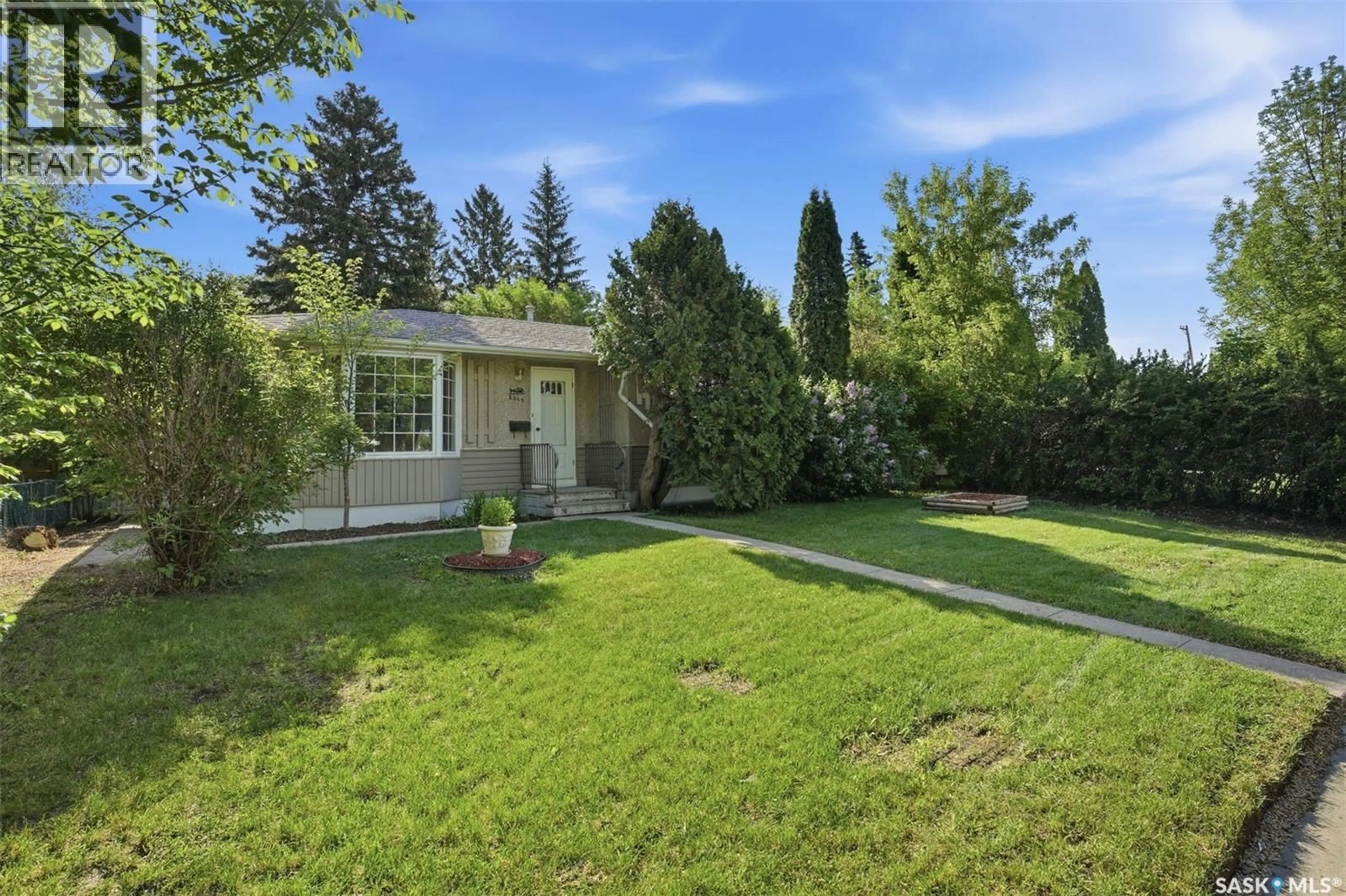 A pic from outside/outdoor area/front of a property/back of a property/a pic from drone, street for 2019 LOUISE AVENUE, Saskatoon Saskatchewan S7J2C1