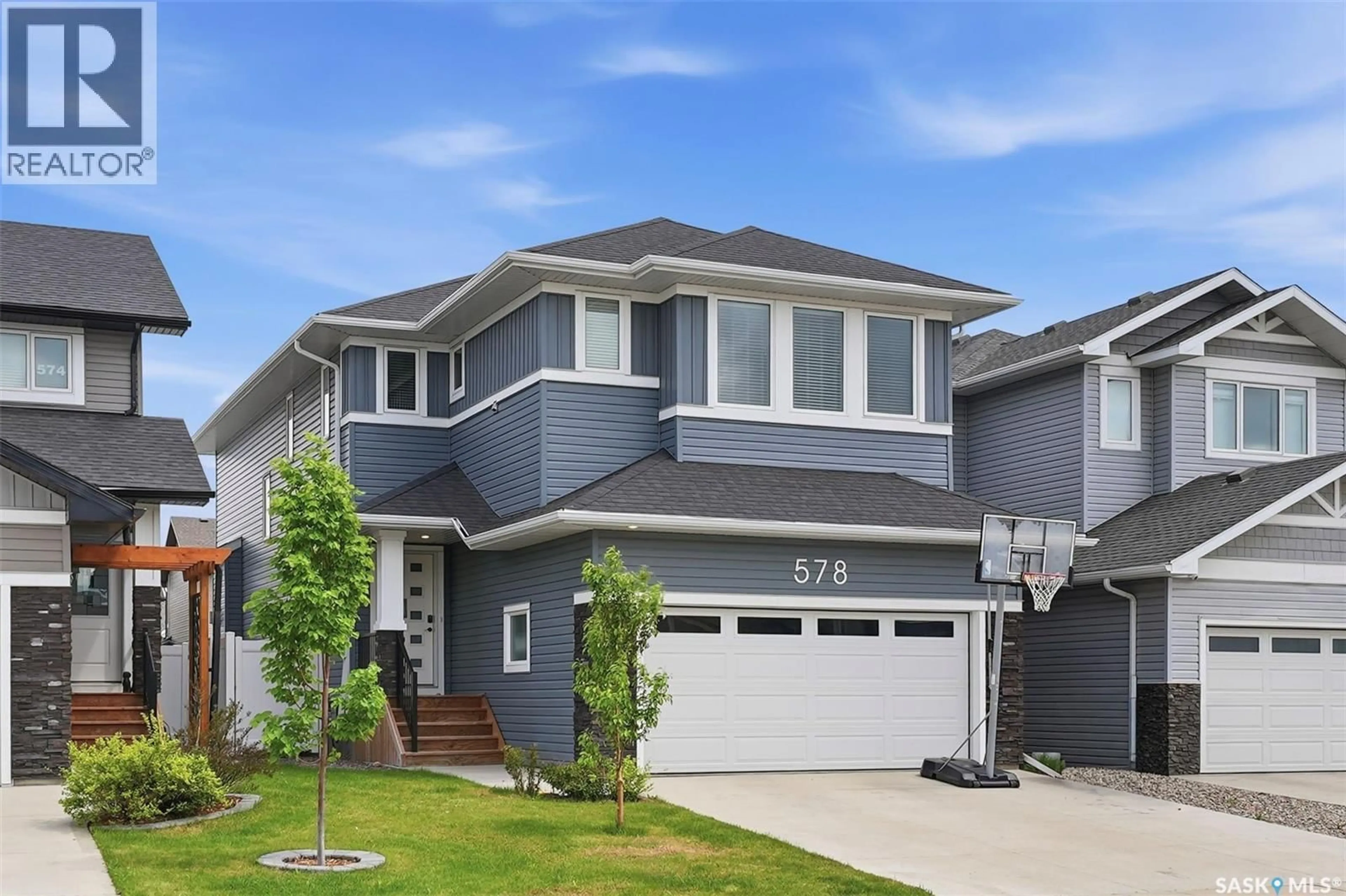 Home with vinyl exterior material, street for 578 MCFAULL CRESCENT, Saskatoon Saskatchewan S7V0T3