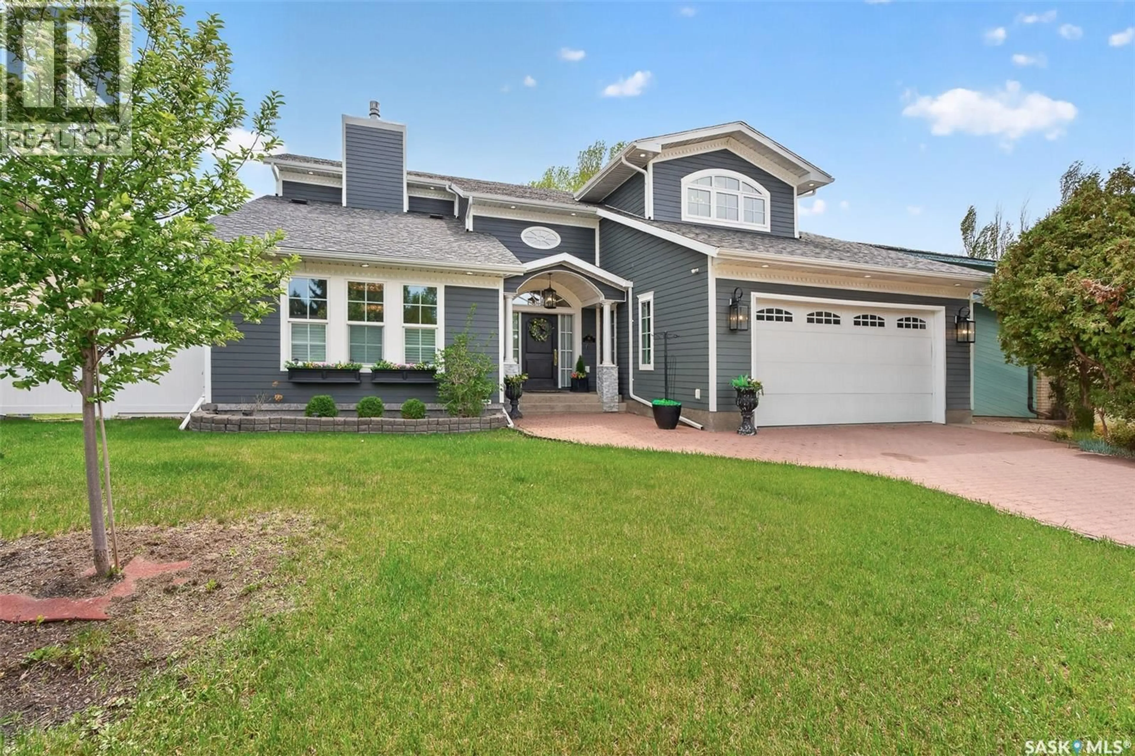 Home with vinyl exterior material, street for 65 CALYPSO DRIVE, Moose Jaw Saskatchewan S6J1G1