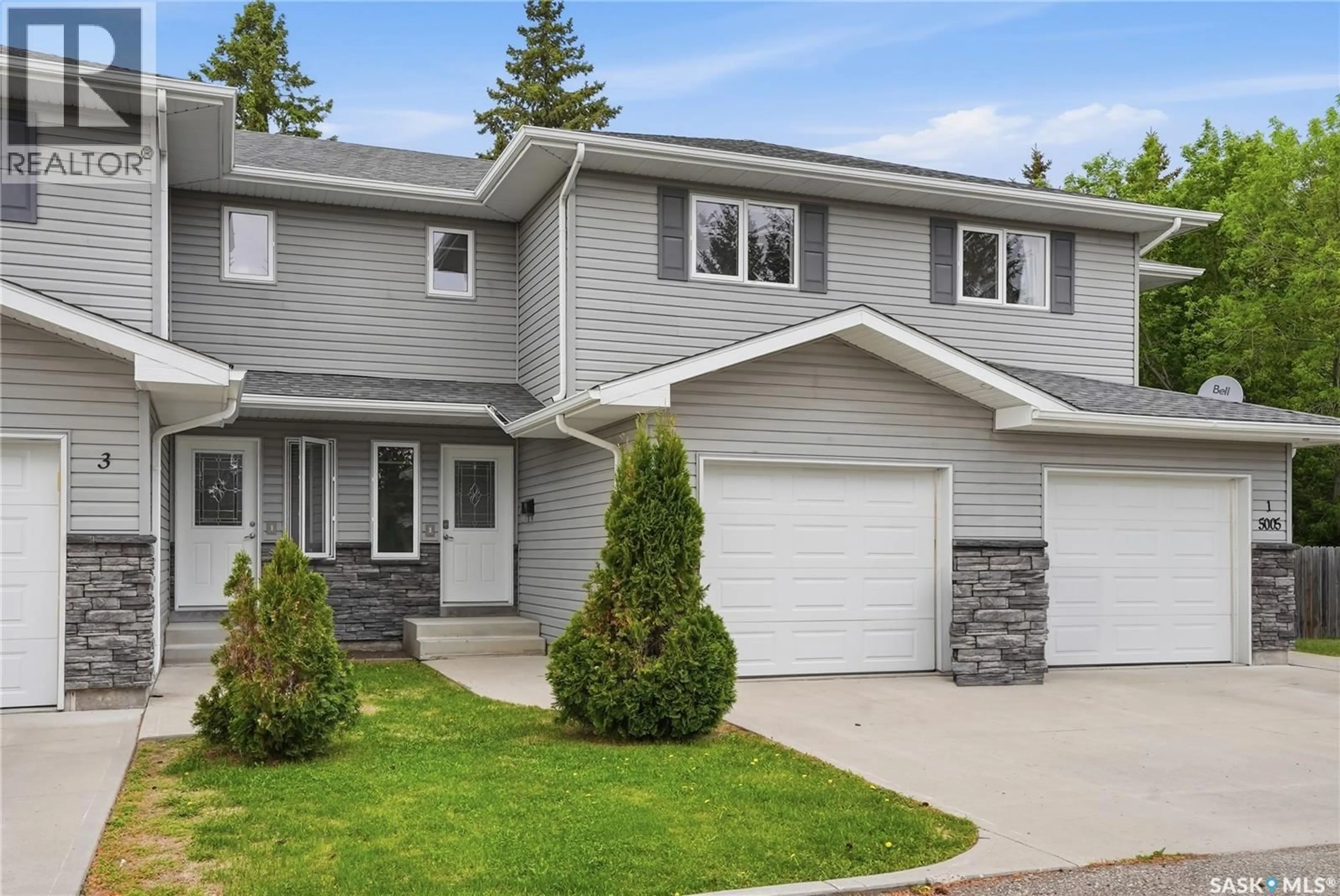 Home with vinyl exterior material, street for 25005 CENTRAL AVENUE, Waldheim Saskatchewan S0K4R0